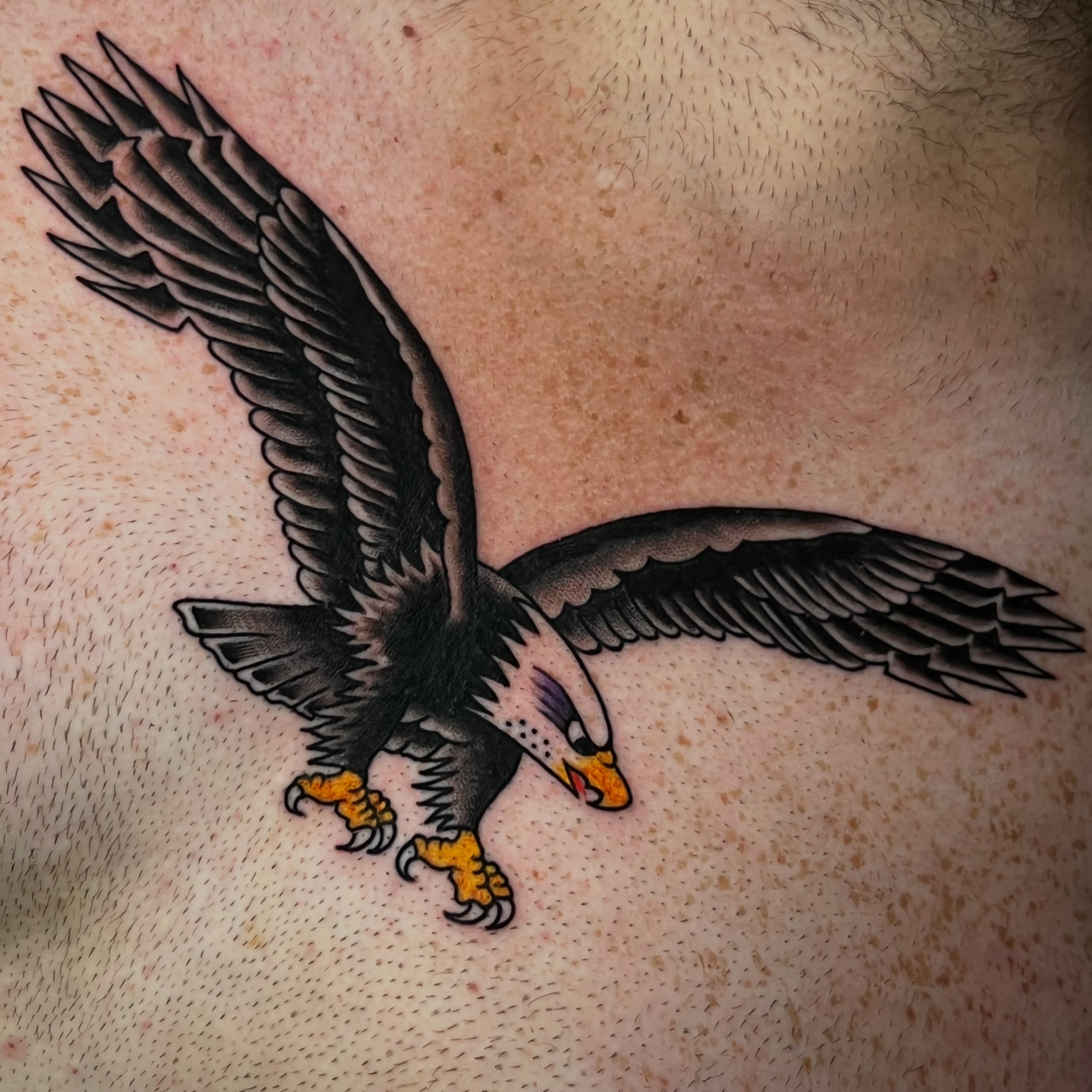 Eagle realism tattoo on the chest by Charlie Campanella