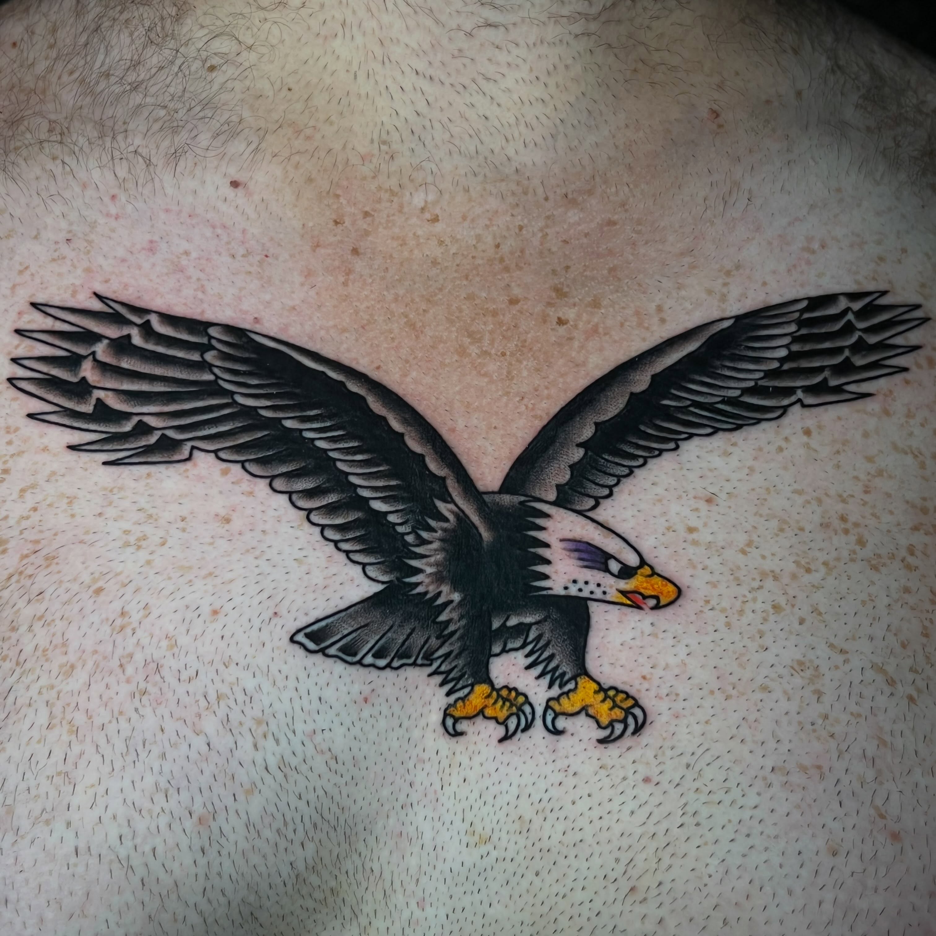 Eagle American traditional tattoo on the chest by Charlie Campanella