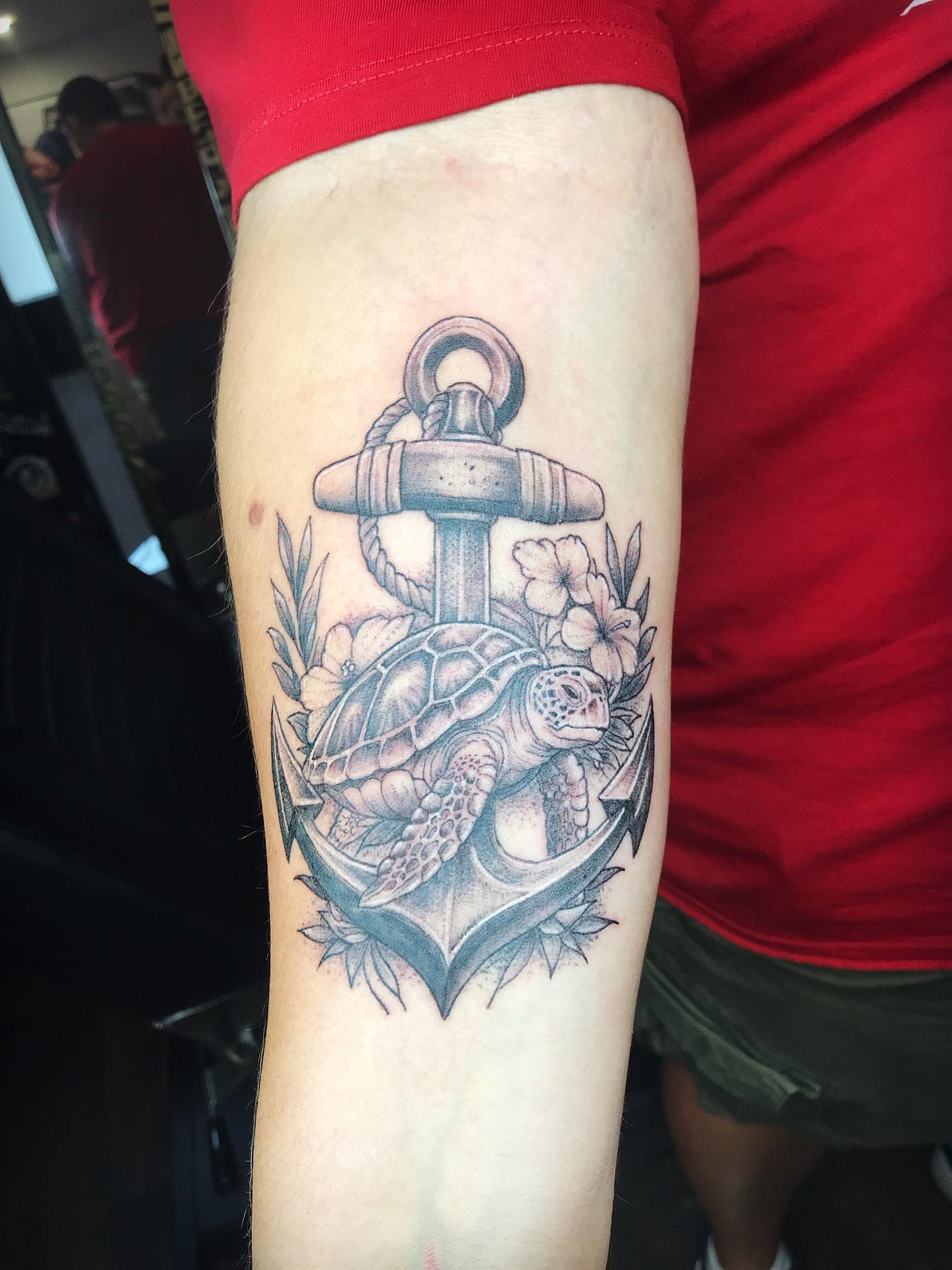 Turtle and anchor American traditional tattoo on the forearm by Moss Quito Tattoo