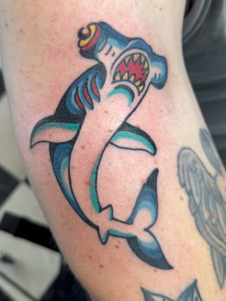 Shark American traditional tattoo on the forearm by Don Robison