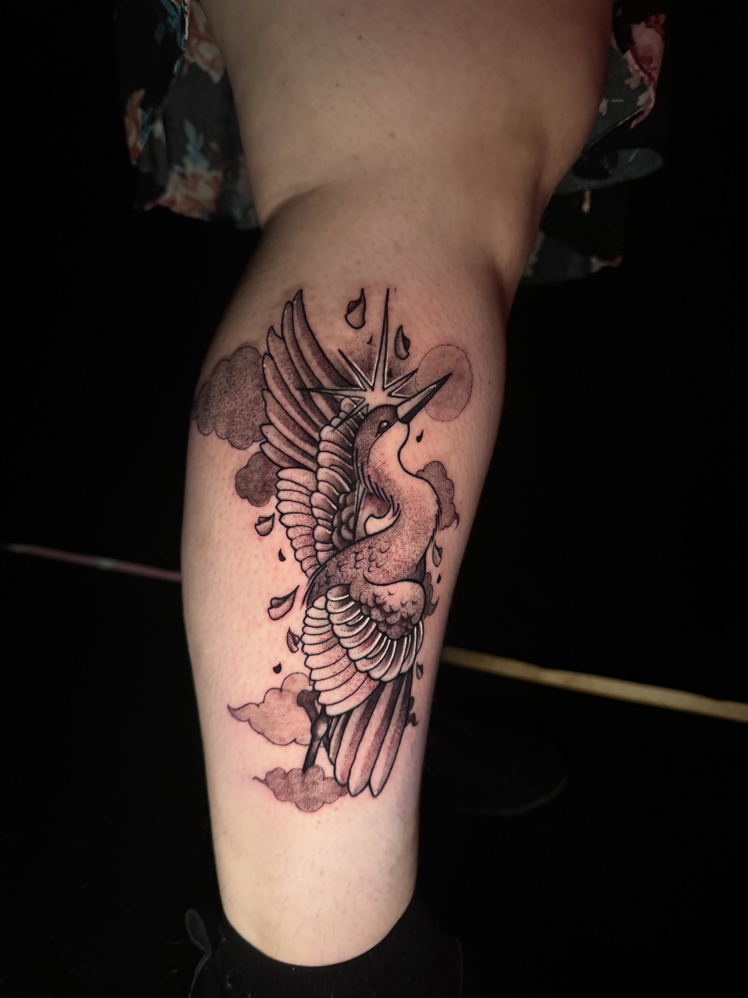 Bird with star black and grey tattoo on the thigh by tori 🫶🏻