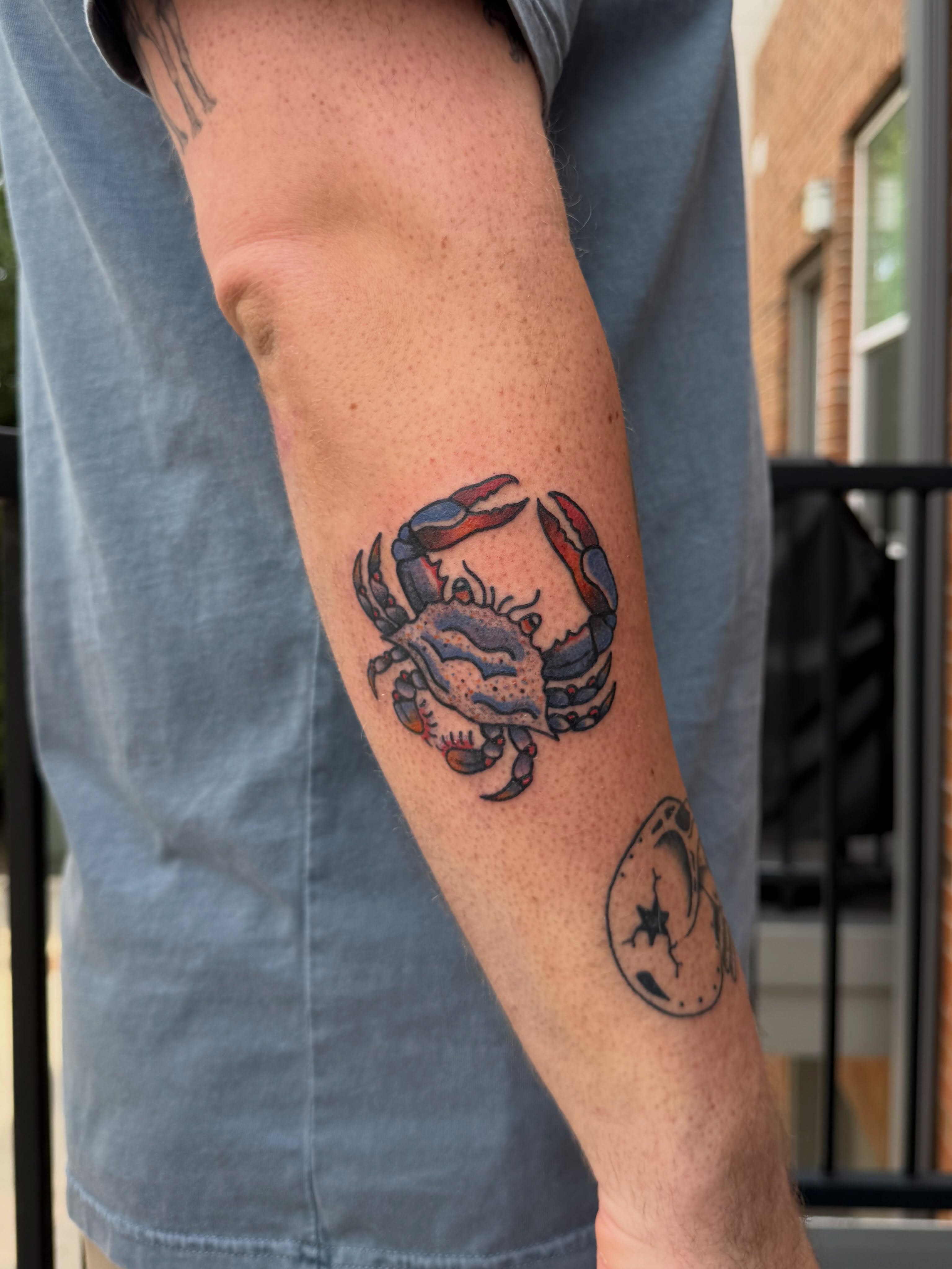 Crab American traditional tattoo on the forearm by Dennis Patterson