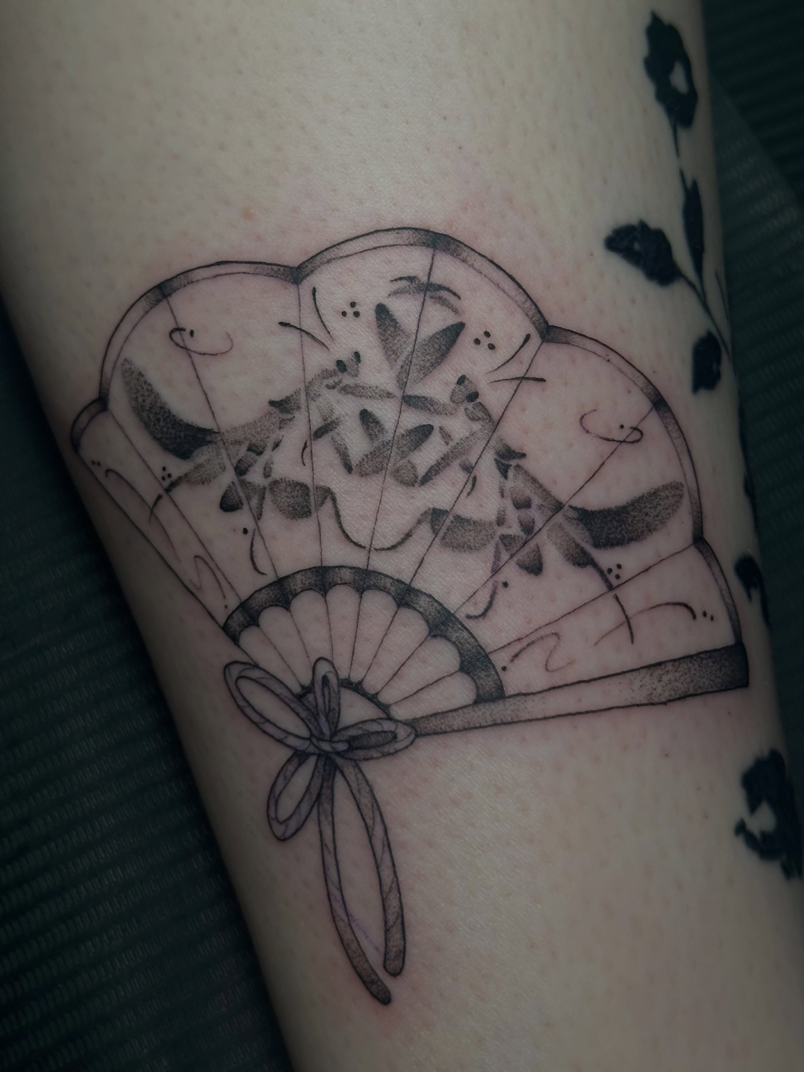 Fan and flowers black and grey tattoo on the forearm by kennedy :) π±πΏ