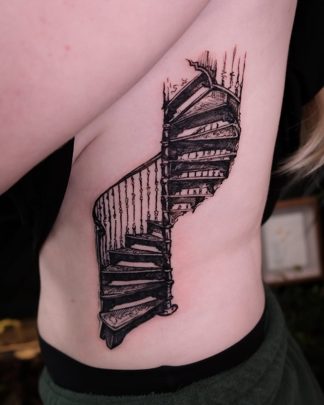 Spiral staircase black and grey tattoo on the ribs by Renee (Koi) Vance