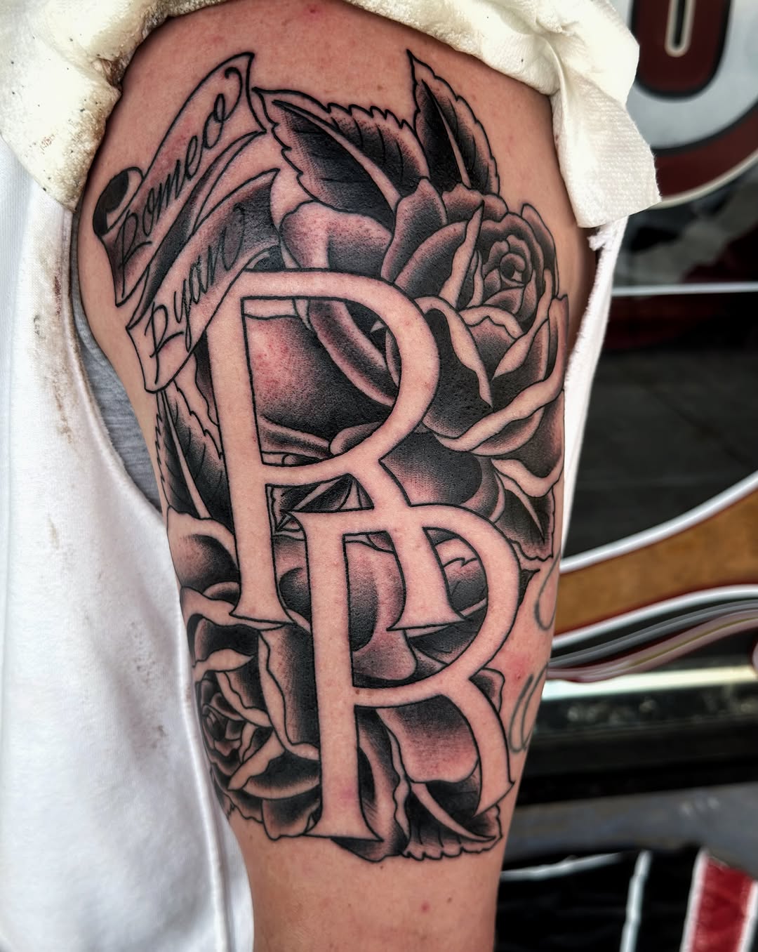Rose and initials realism tattoo on the thigh by @sloanxkettering