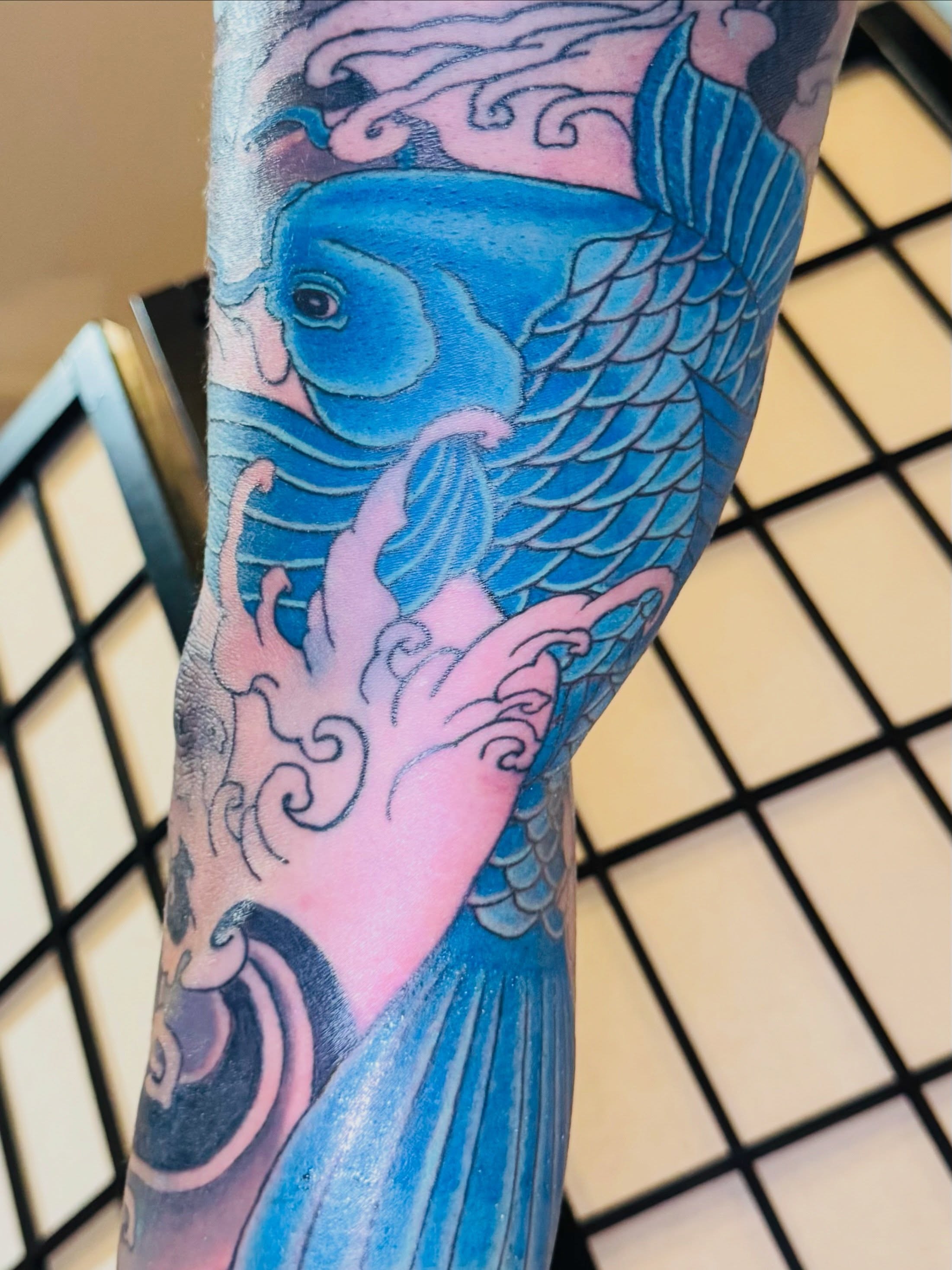 Koi fish japanese irezumi tattoo on the forearm by Ink Napawong