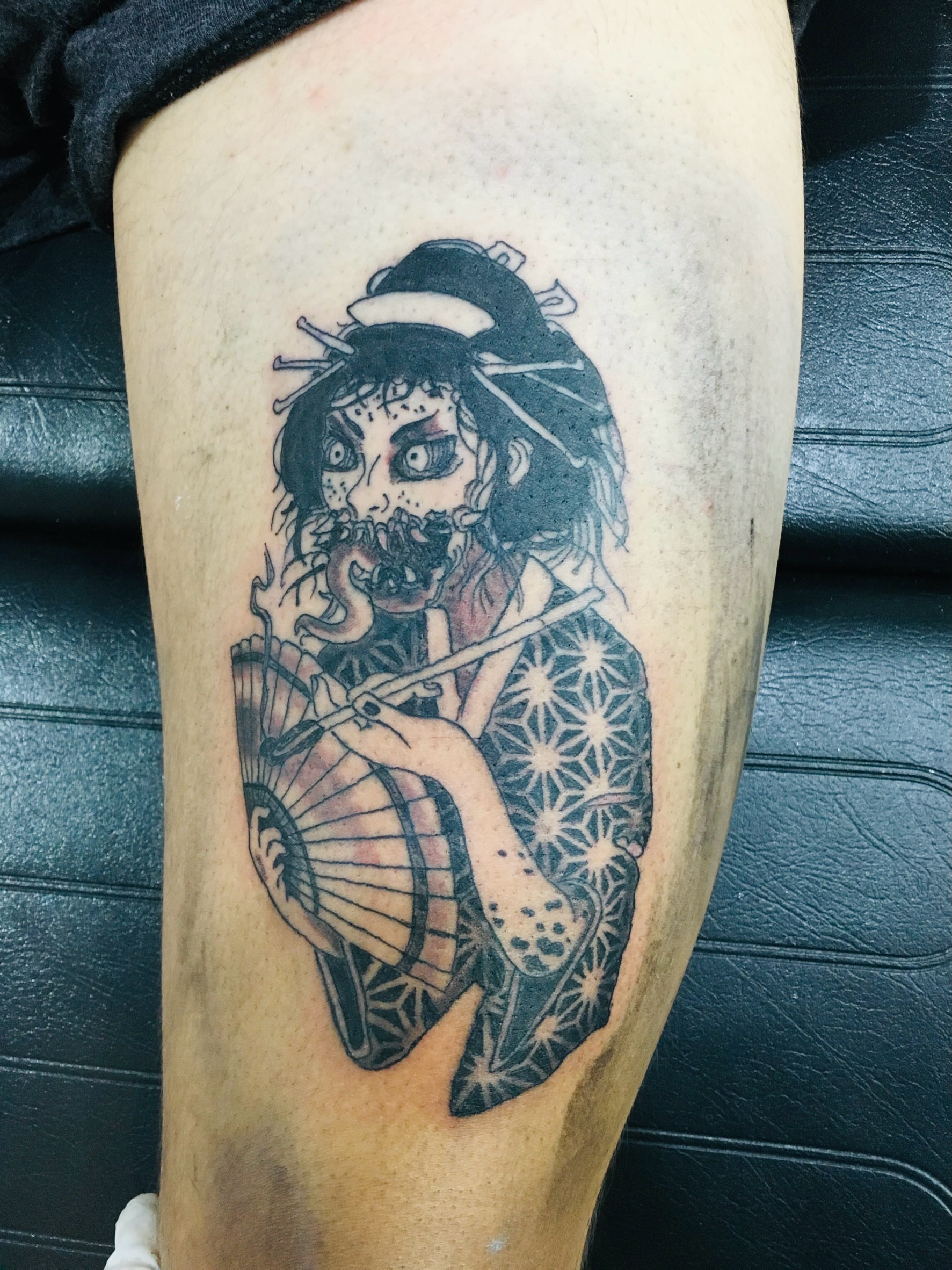 Geisha playing flute japanese irezumi tattoo on the thigh by Ink Napawong