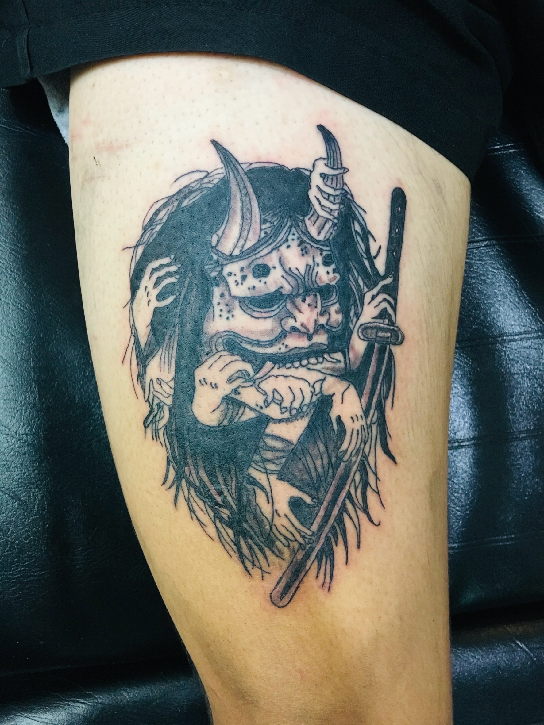 Demon warrior realism tattoo on the thigh by Ink Napawong