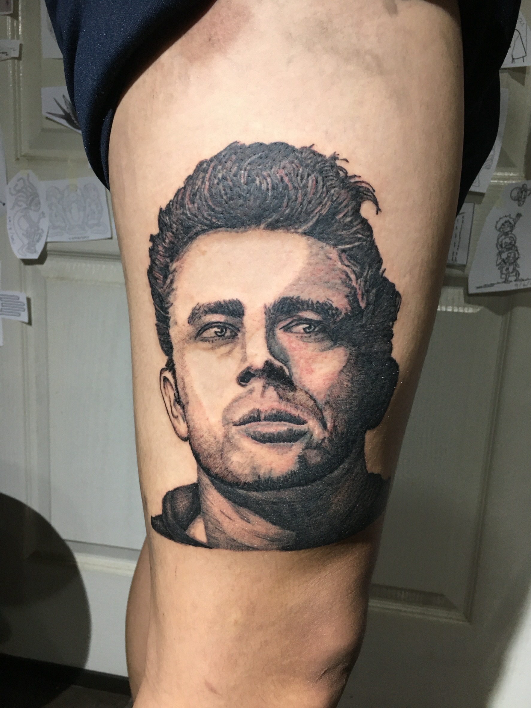 Portrait realism tattoo on the thigh by Ink Napawong
