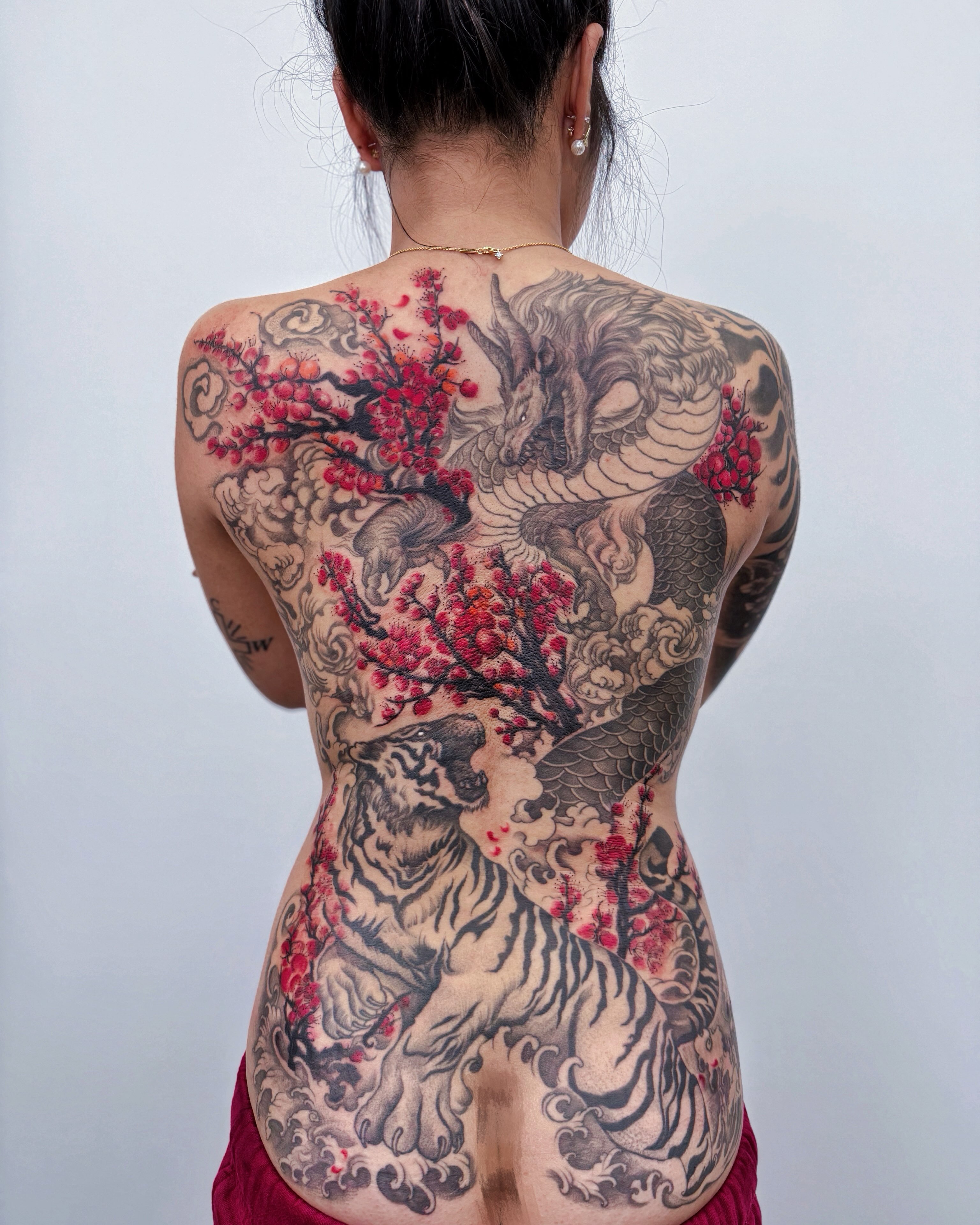 Dragon and tiger japanese irezumi tattoo on the back by Jiang_Tattooer