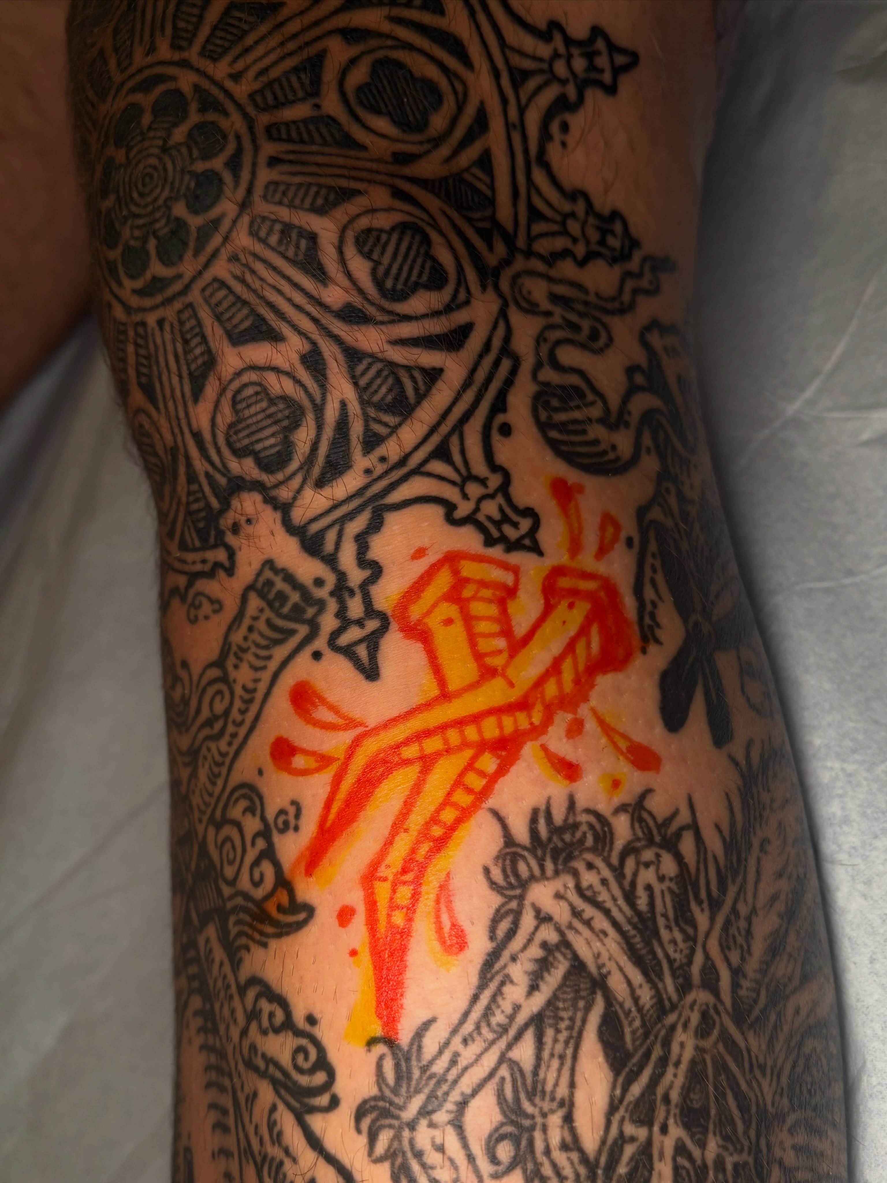 Cross and flames American traditional tattoo on the forearm by 𝕵𝖊𝖗𝖊𝖒𝖞 𝕻𝖚𝖗𝖈𝖊𝖑𝖑