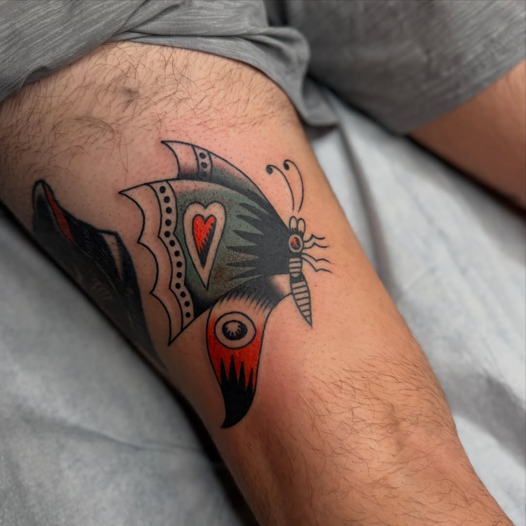 Bird American traditional tattoo on the forearm by Andrew Storm