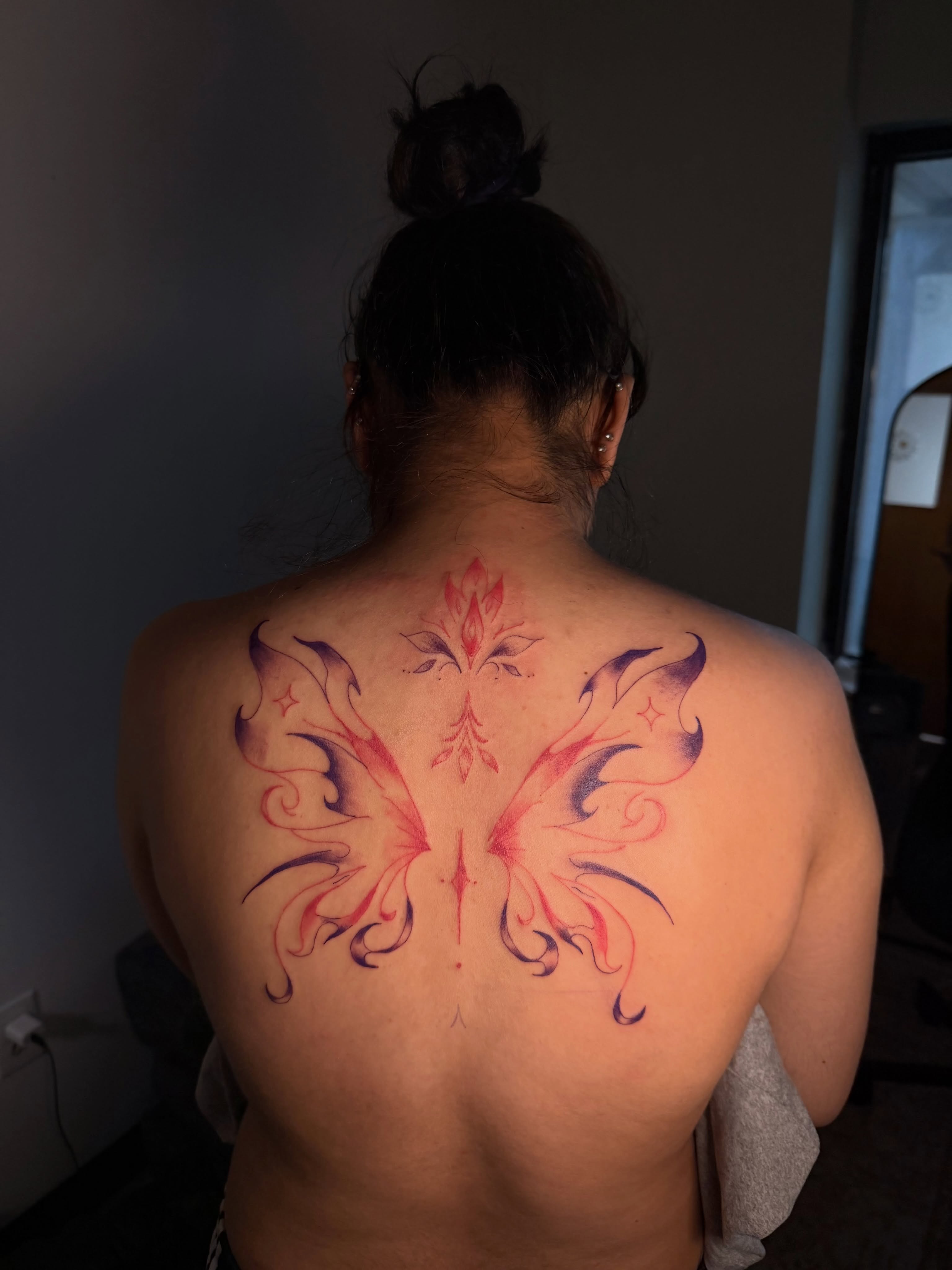 Butterfly new school tattoo on the back by Sebastian martinez, Memphis, Tennessee