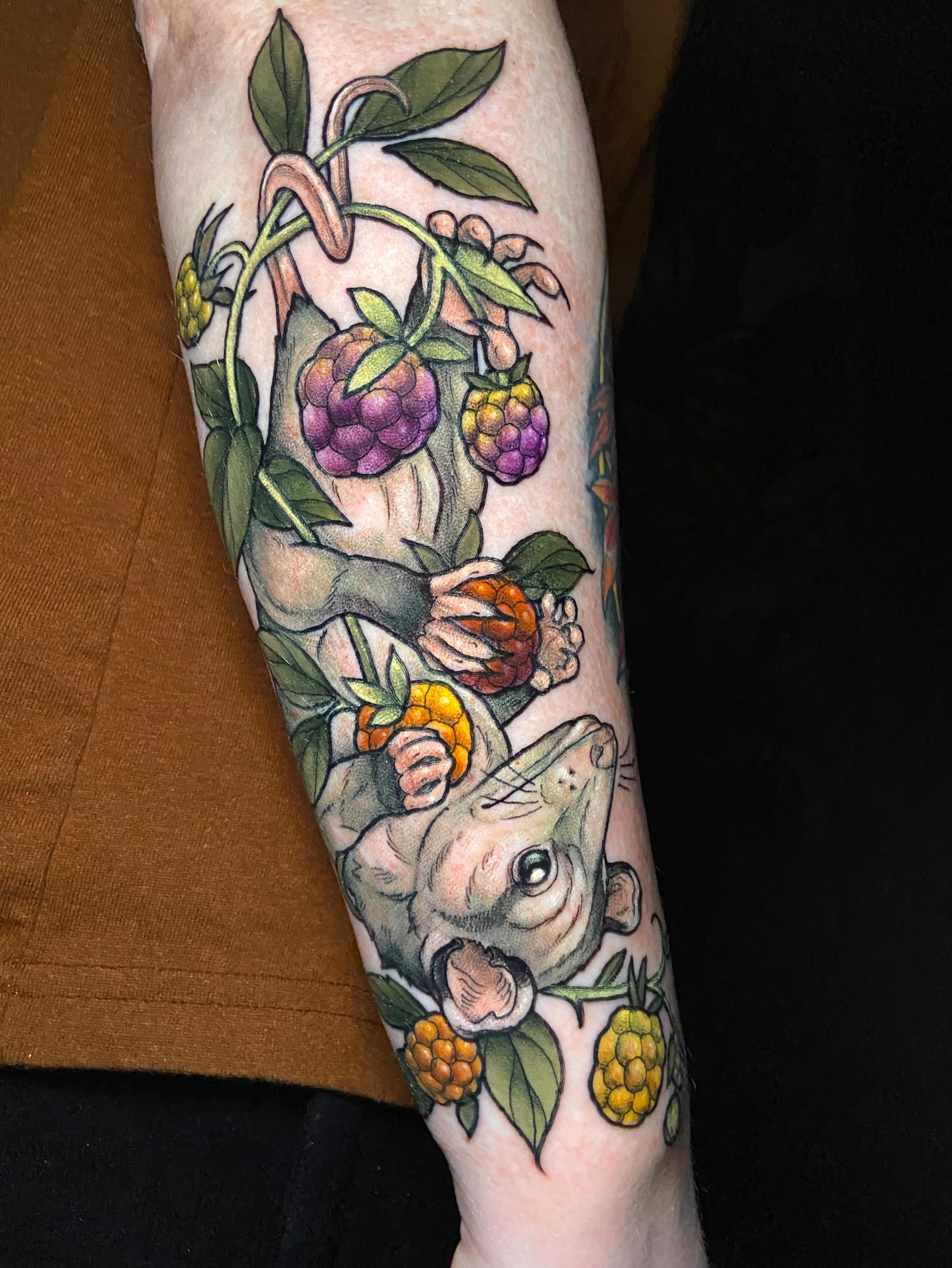 Monkey with fruit realism tattoo on the forearm by Dawn Carr, Richmond, Virginia