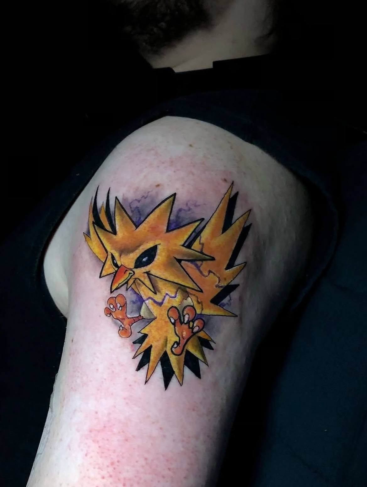 Bird new school tattoo on the shoulder by Frank Miller