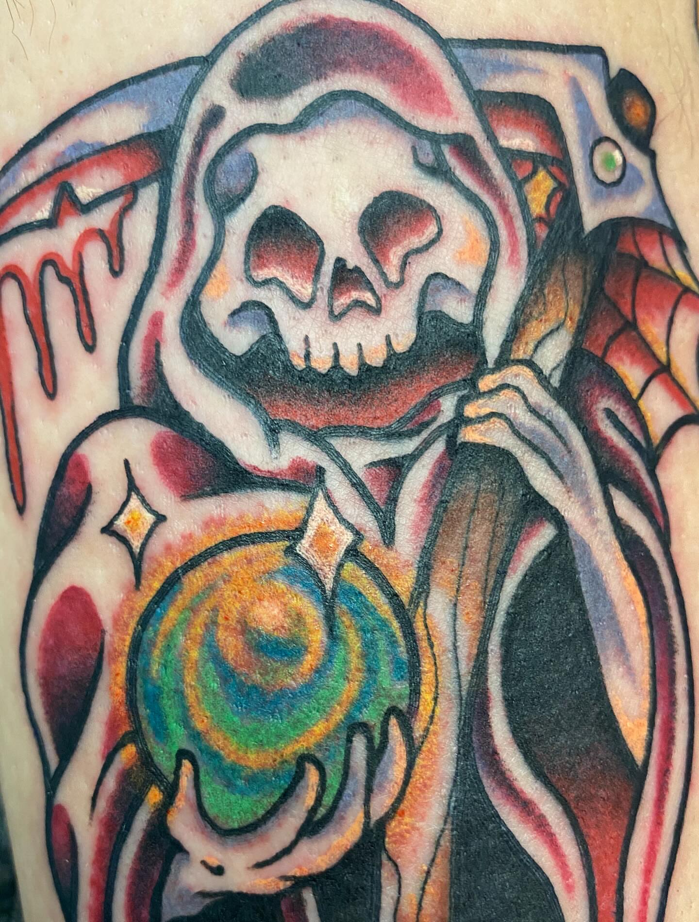 Skull and orb American traditional tattoo on the forearm by Jonah