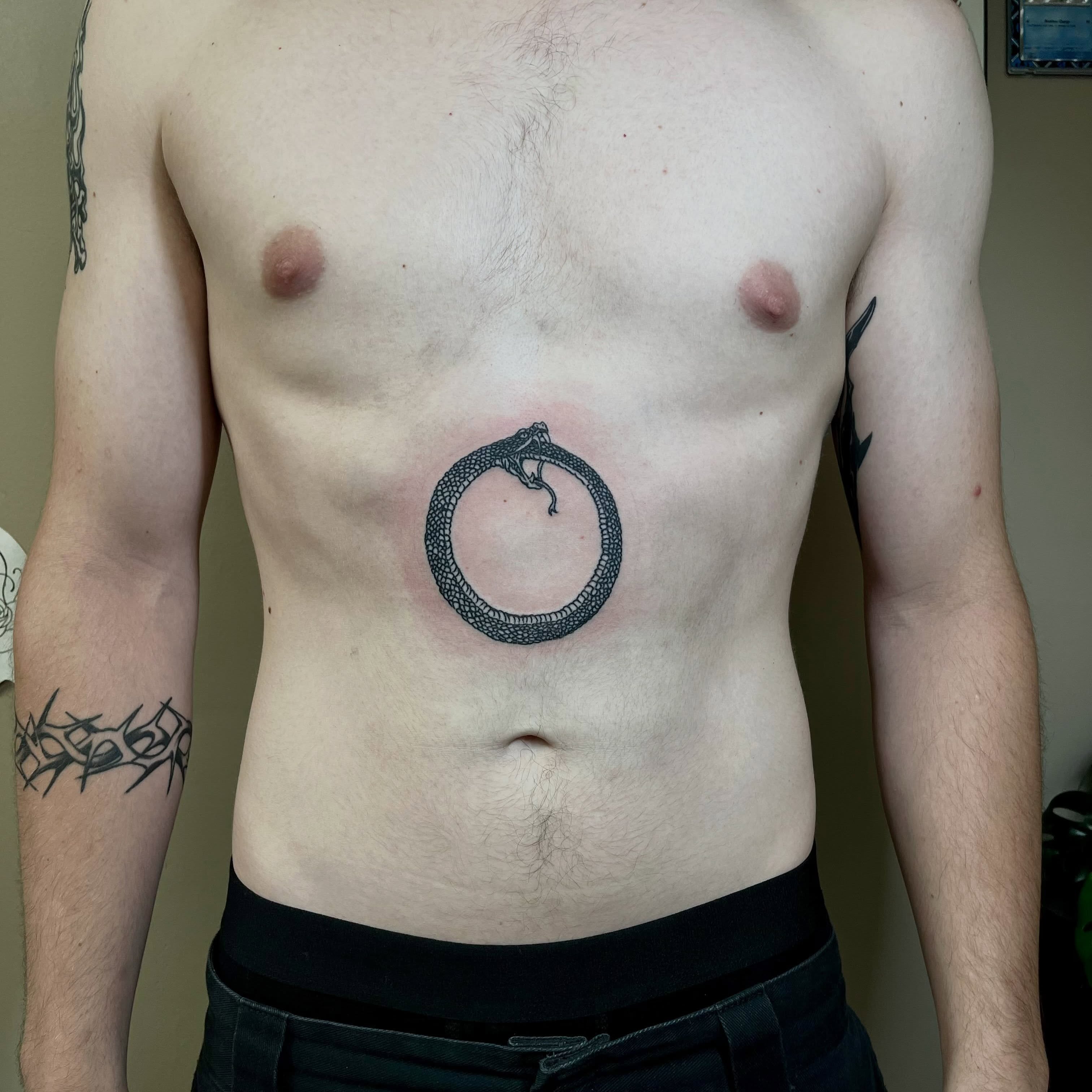 Snake dotwork tattoo on the chest by ᴴᴬᴺᴺᴬᴴ ᴿᵁᴰᴰᴱᴸᴸ