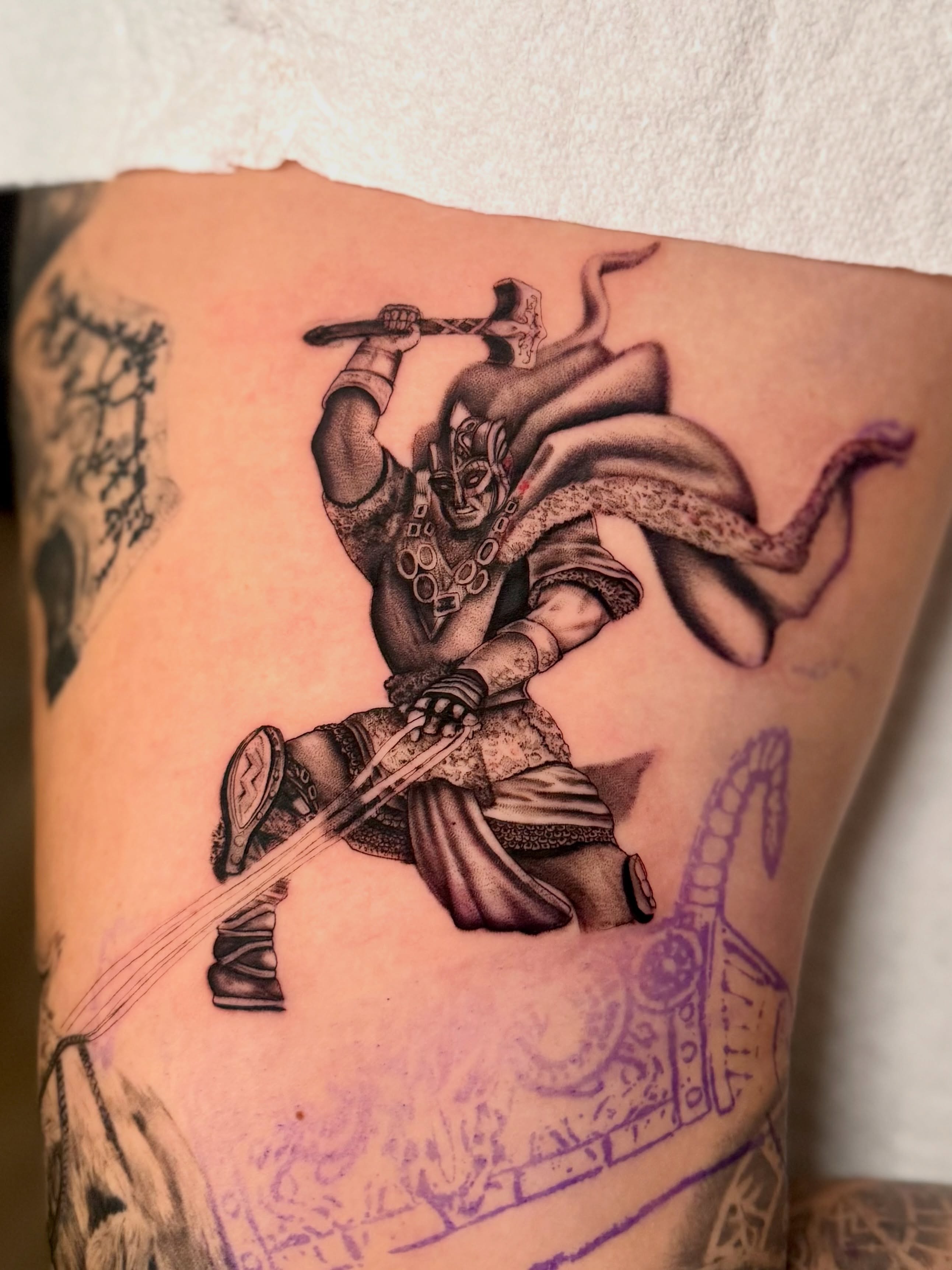 Warrior with snake black and grey tattoo on the thigh by Tatum