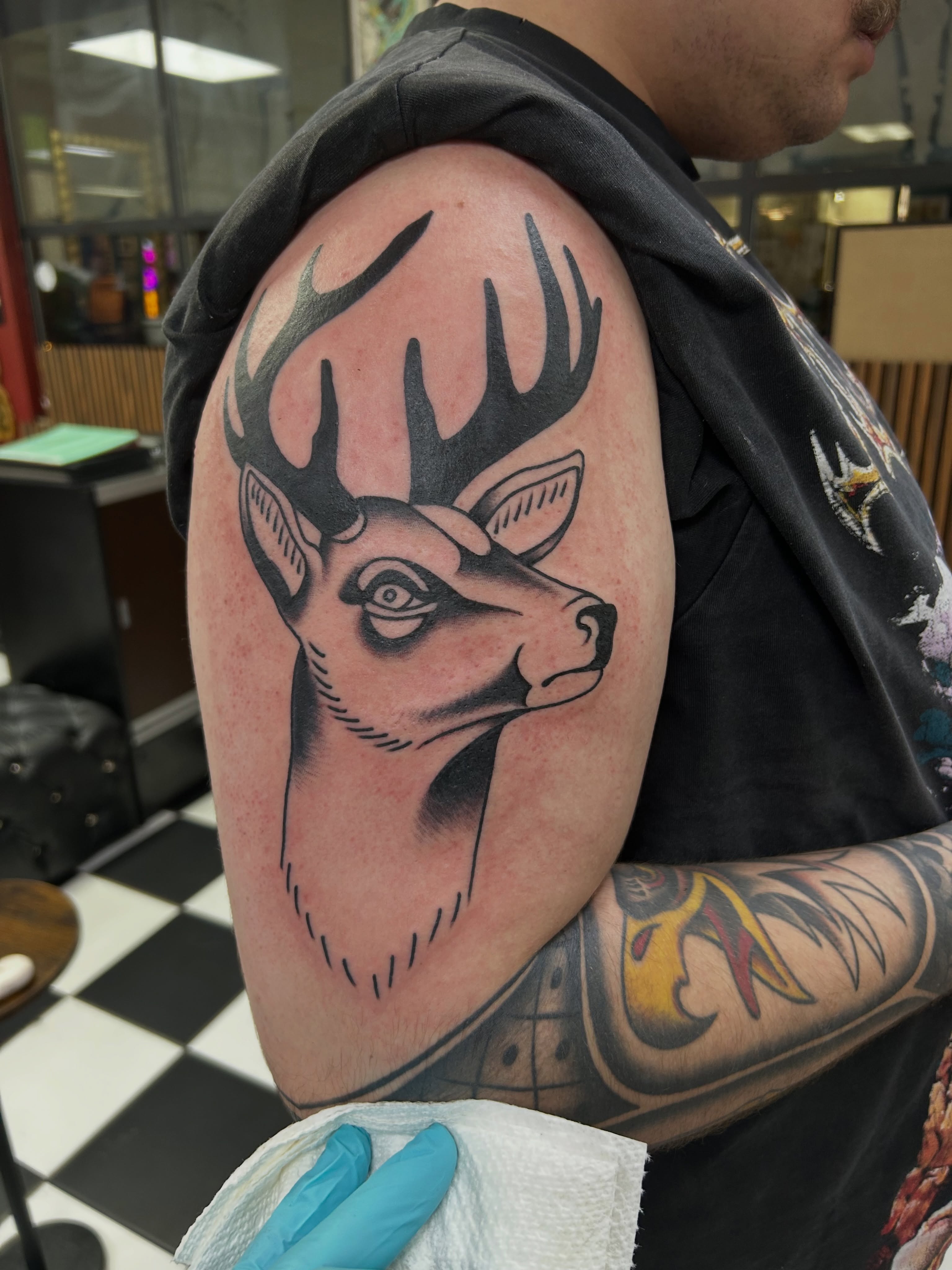 Deer head black and grey tattoo on the shoulder by Tattoos by Corey aka MrLu