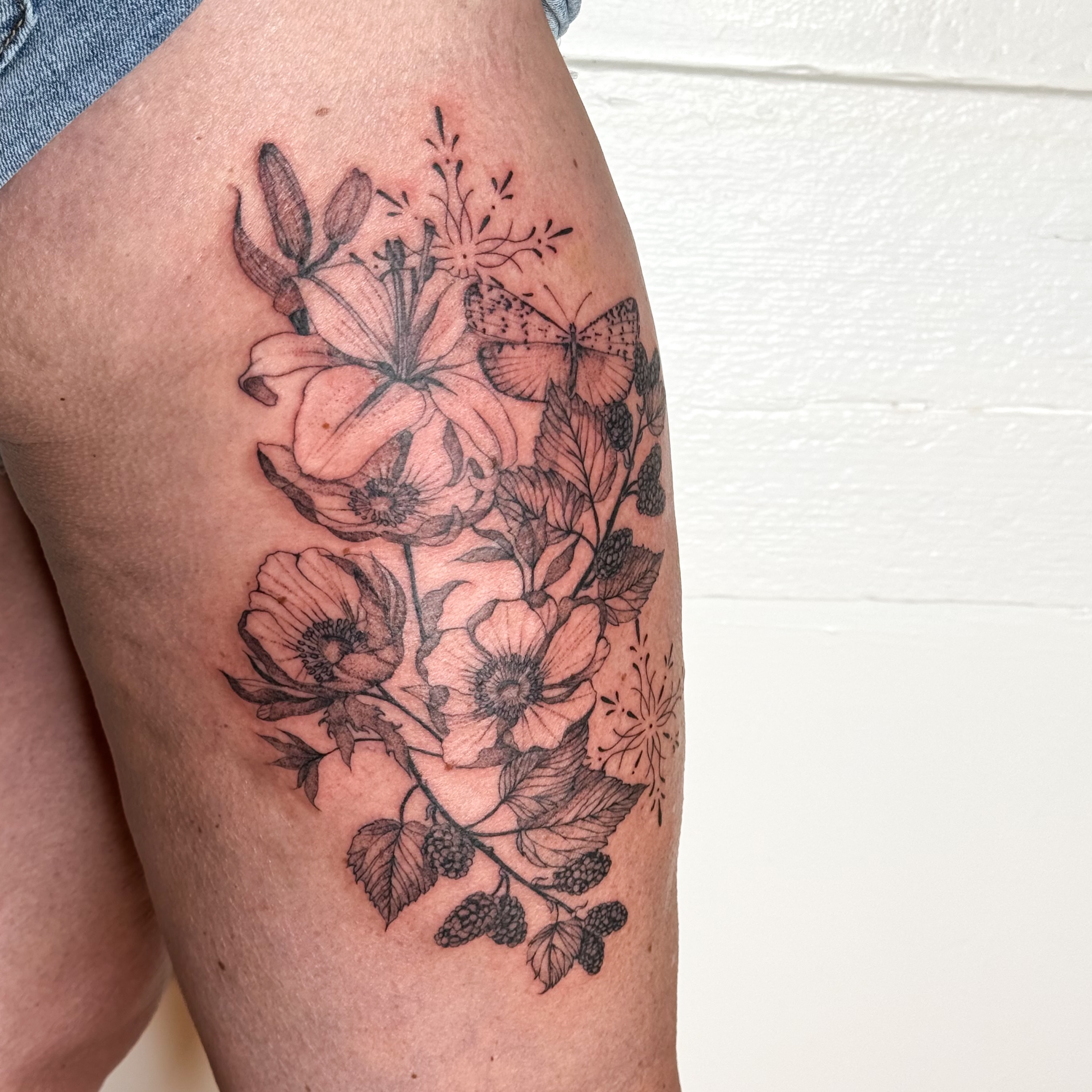 Floral bouquet realism tattoo on the thigh by ❁ Marlo Marquise Tattoo Artist ❁