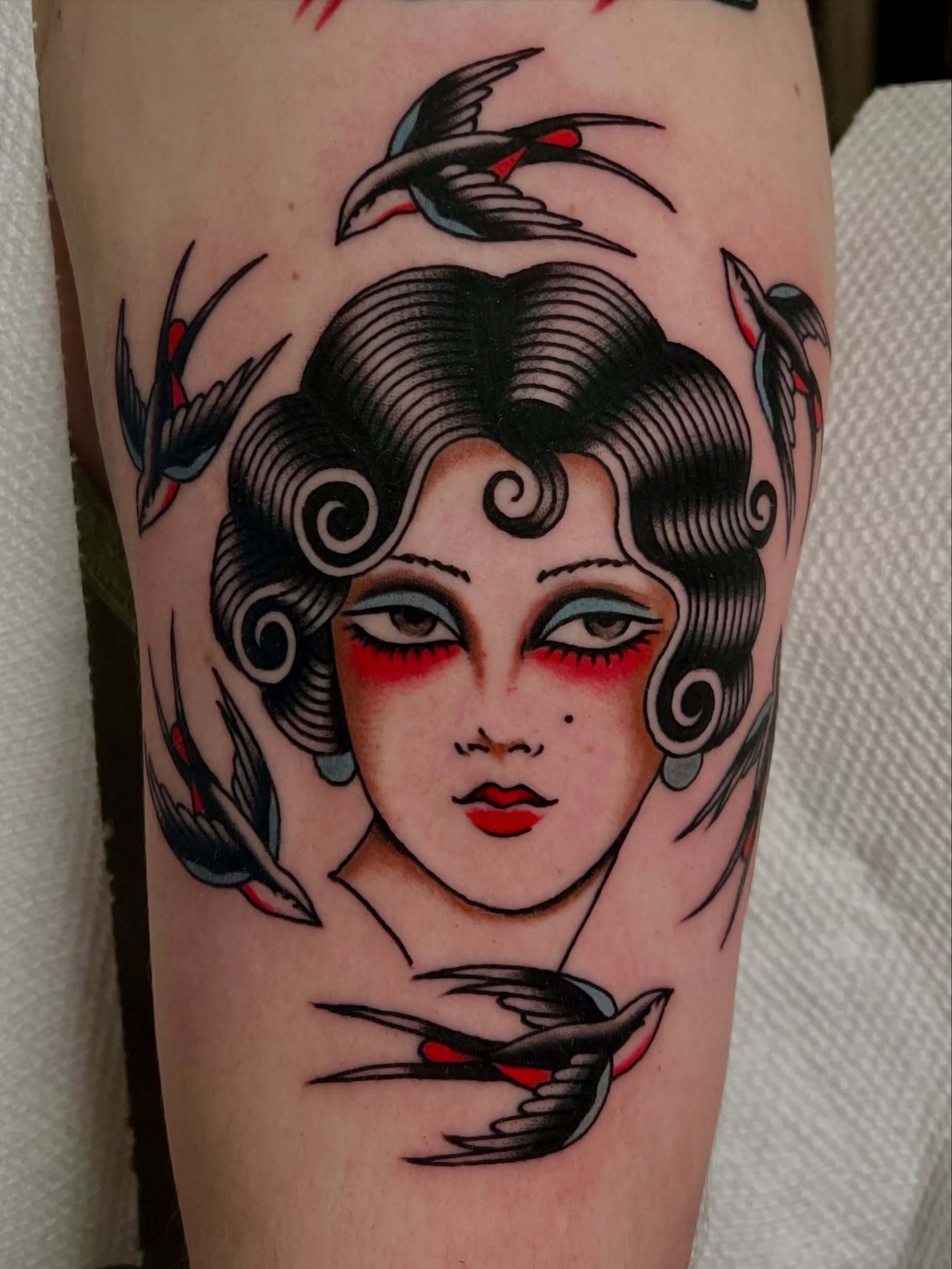 Woman with birds American traditional tattoo on the forearm by Liv :)