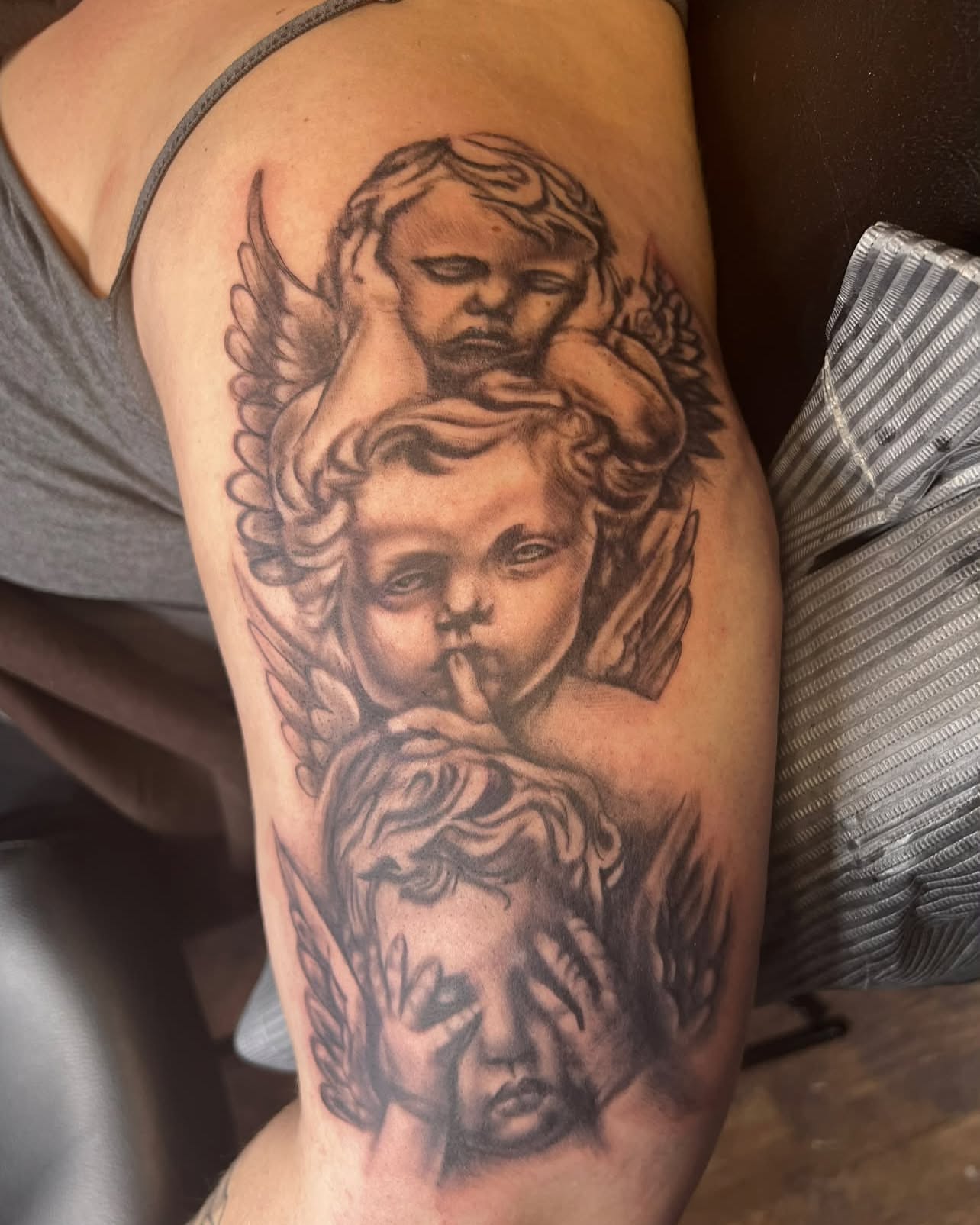 Cherubs realism tattoo on the forearm by Don Juan Ink Therapy, Jamesburg, New Jersey