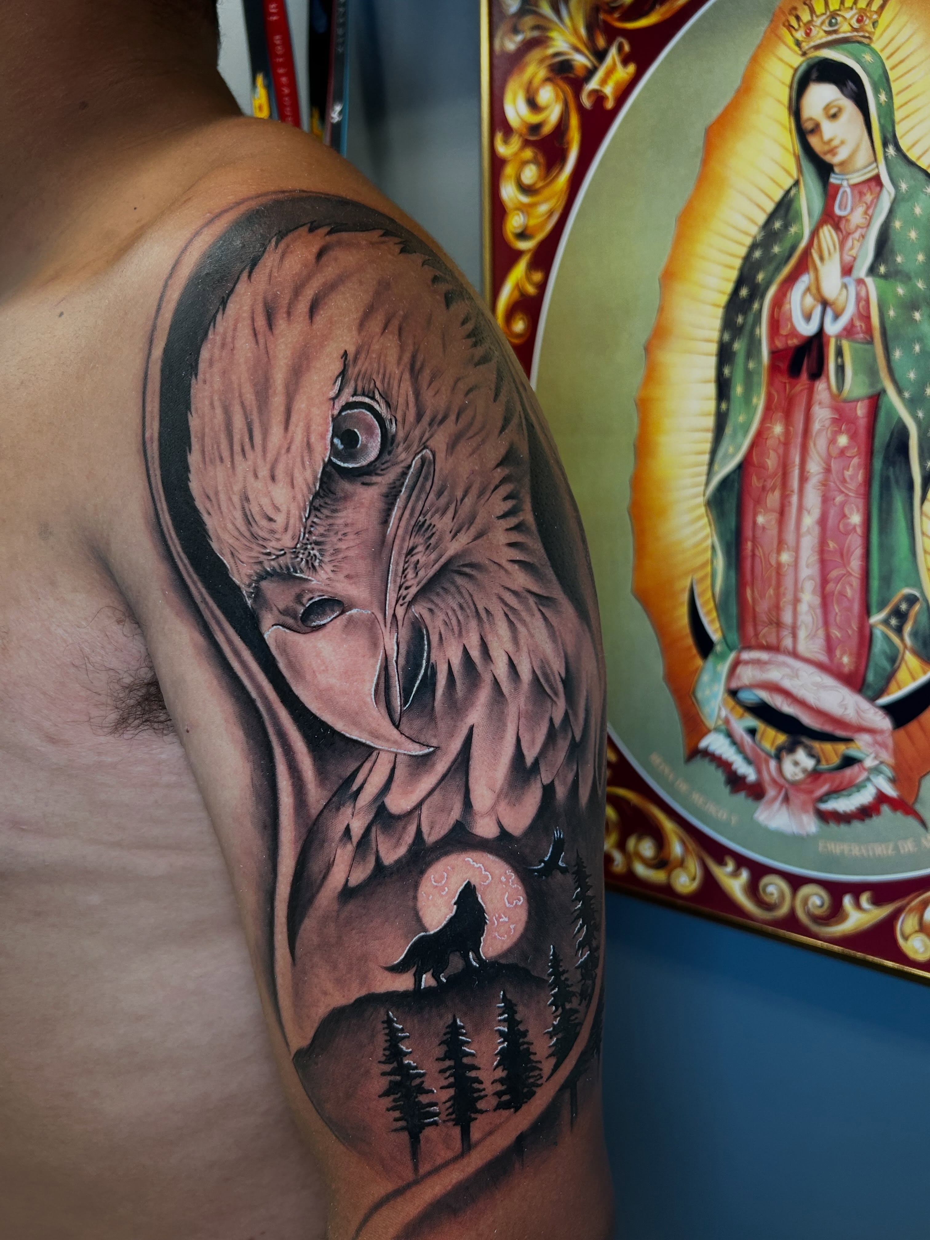 Owl and wolf realism tattoo on the shoulder by Denis Morello de Castro, South River, New Jersey
