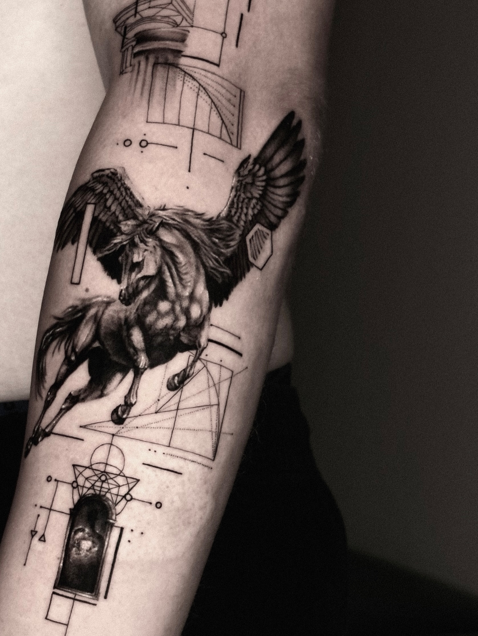 Pegasus geometric tattoo on the forearm by Seraph Geometry