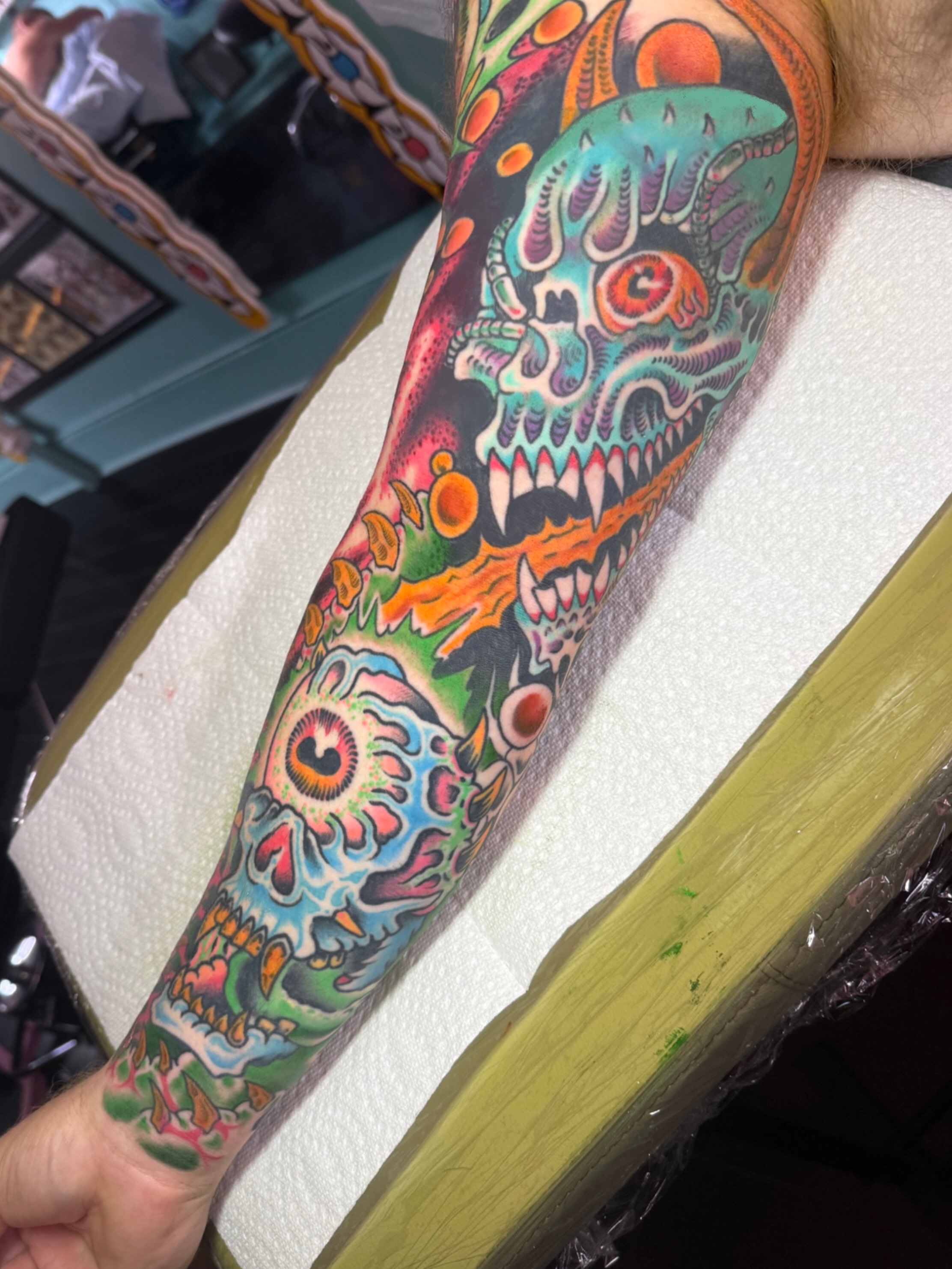 Sugar skulls American traditional tattoo on the forearm by Chris Bishop