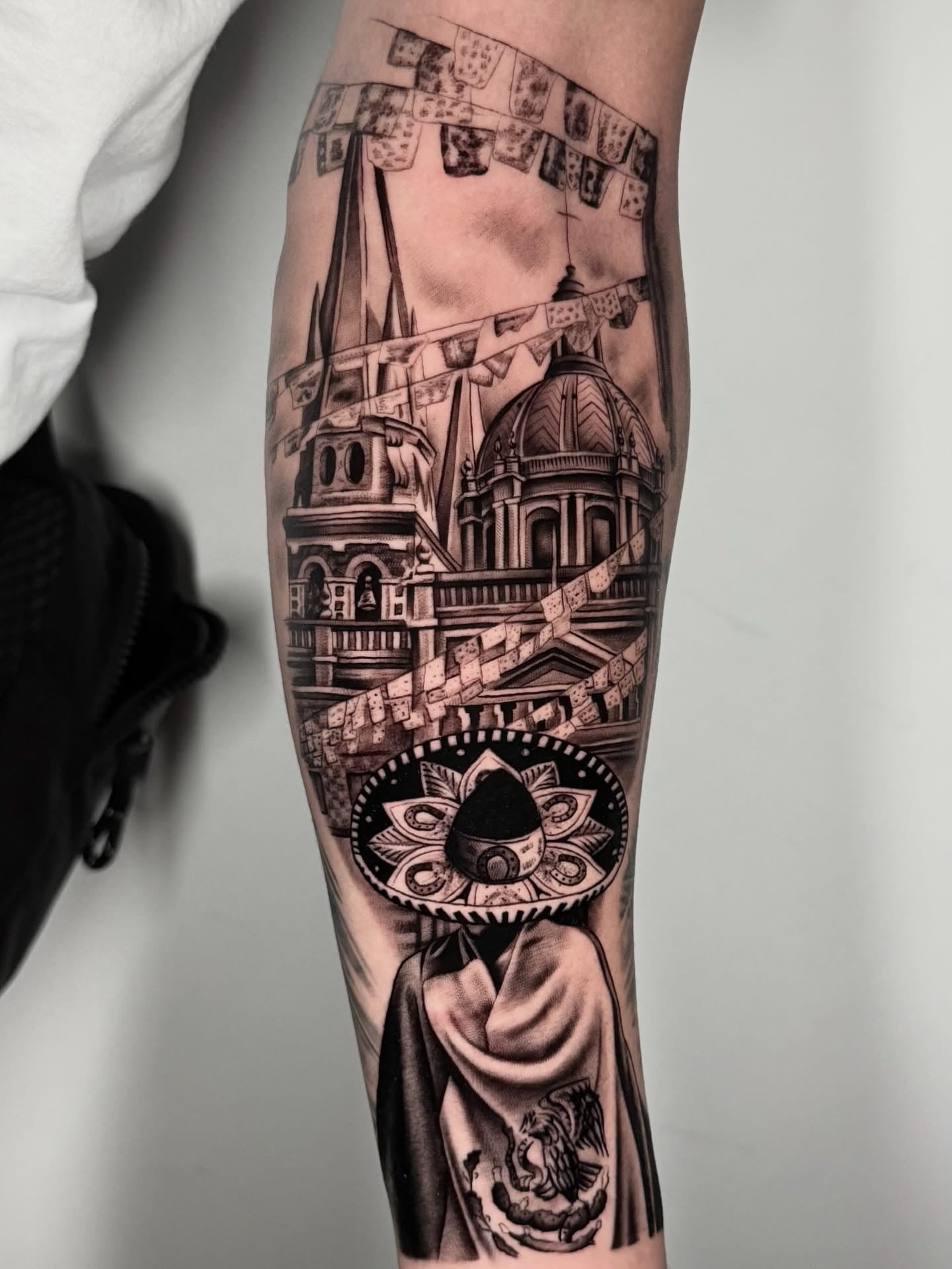 Religious architecture realism tattoo on the forearm by Elijah Tattoos, San Diego, California