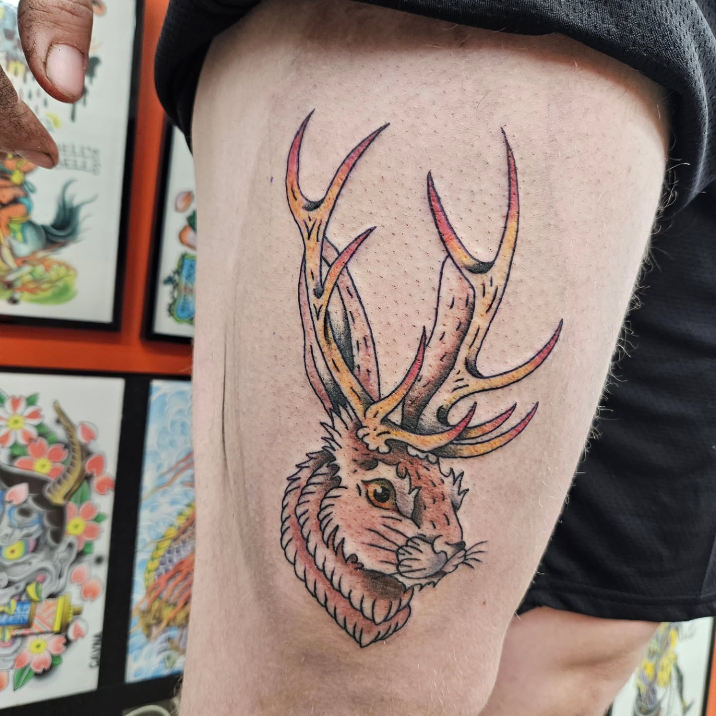 Stag head American traditional tattoo on the thigh by MK Stevens - Greeley Based Tattoo Artist
