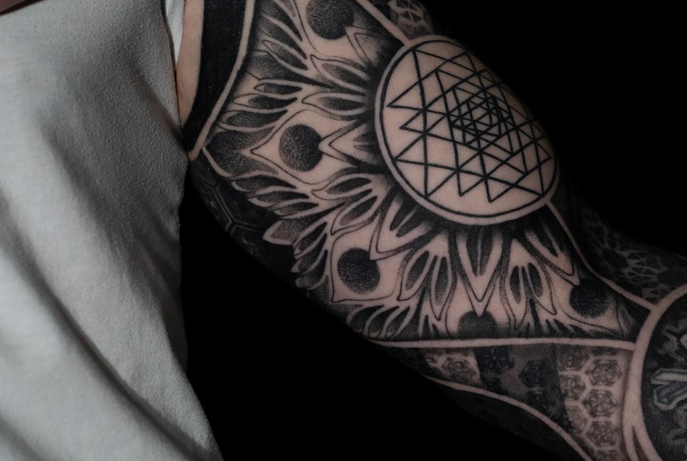 Geometric design geometric tattoo on the forearm by Josaline Green