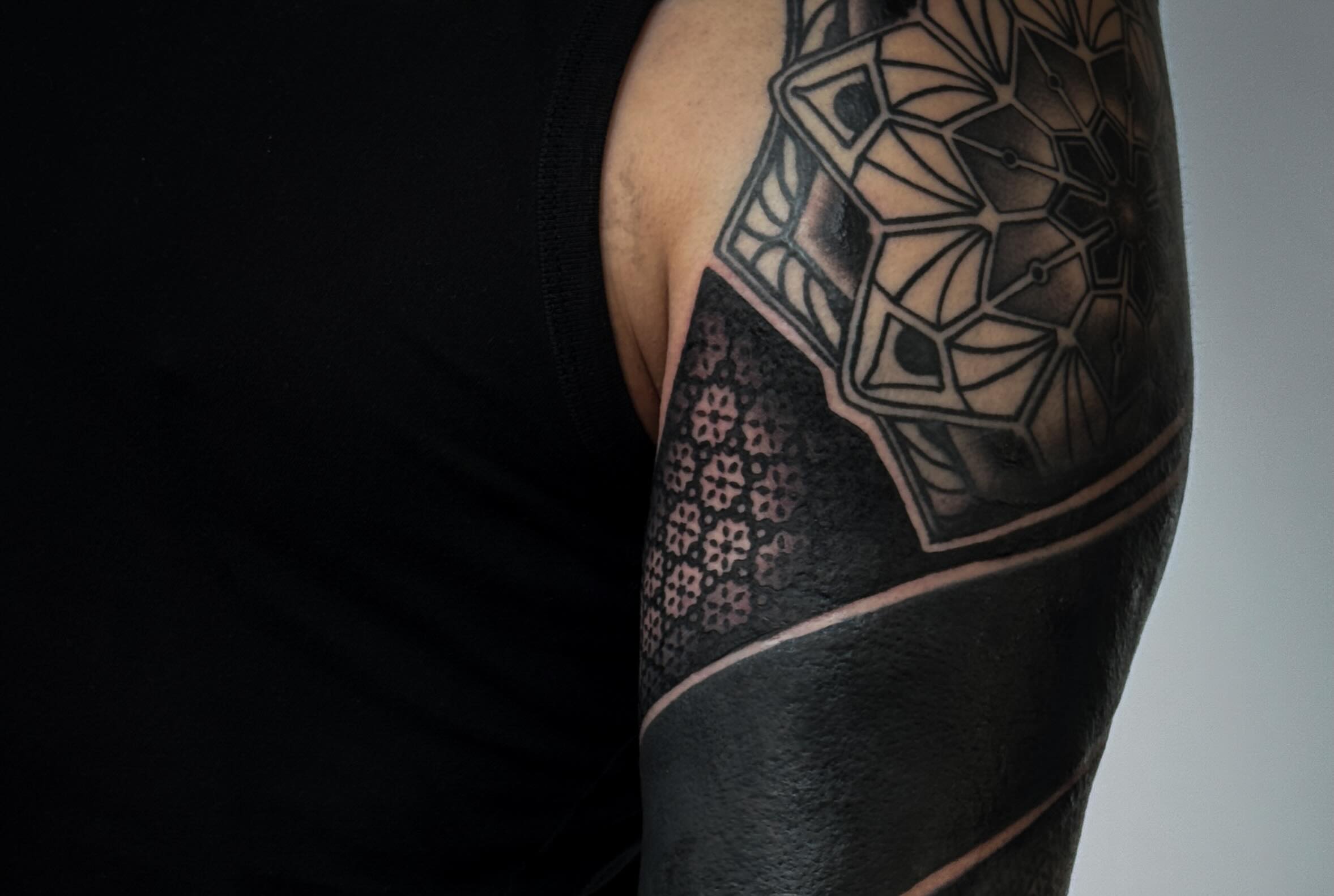 Geometric pattern geometric tattoo on the forearm by Josaline Green