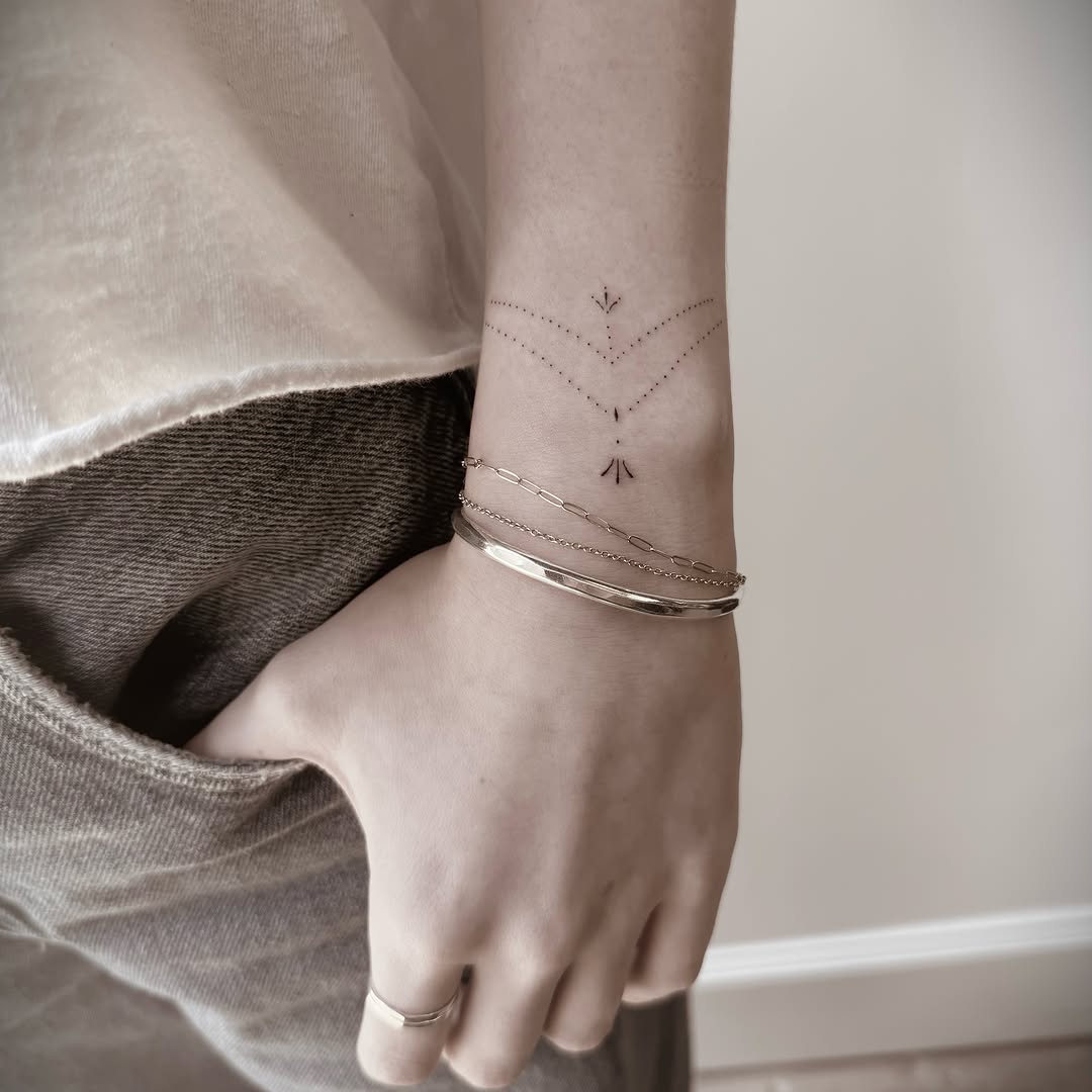 Geometric design geometric tattoo on the forearm by Chanel Picquelle, Nashville, Tennessee