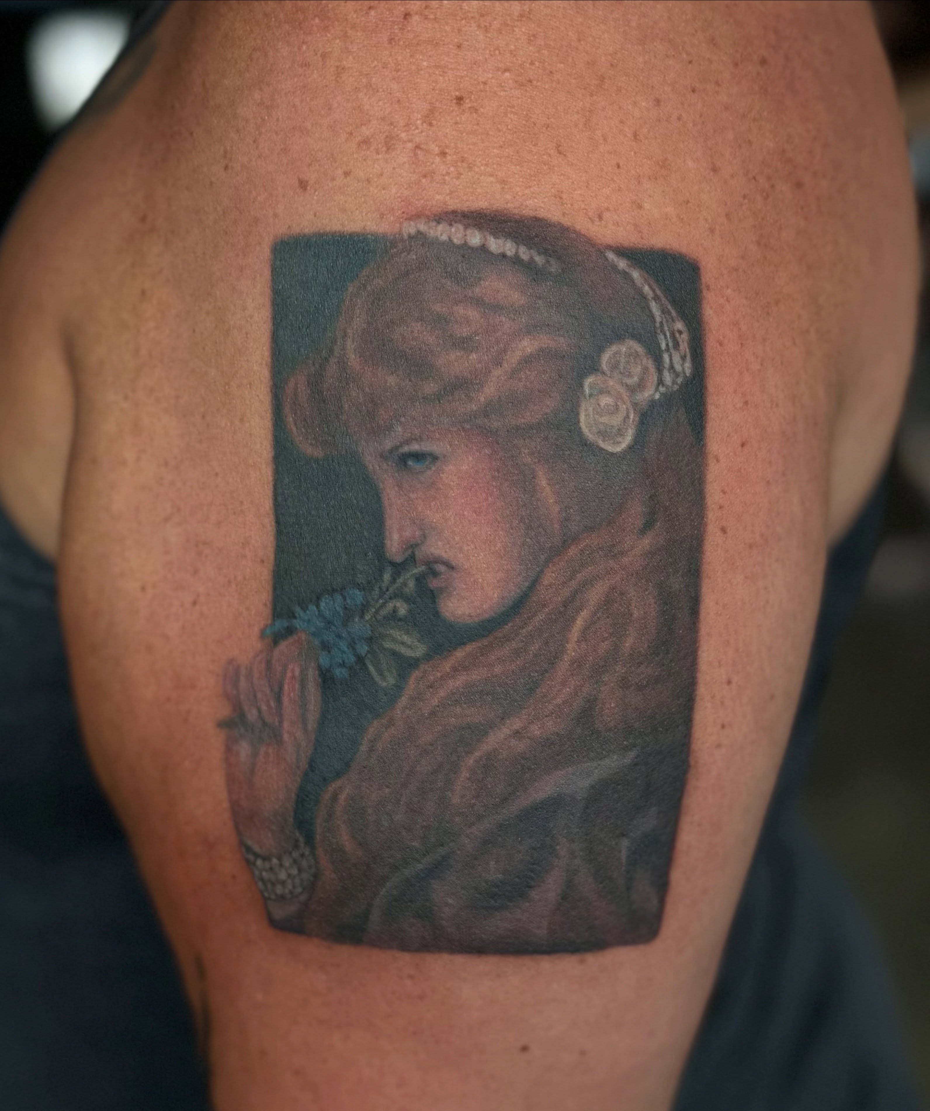 Woman with flower realism tattoo on the shoulder by Glory Pechonis πΏ