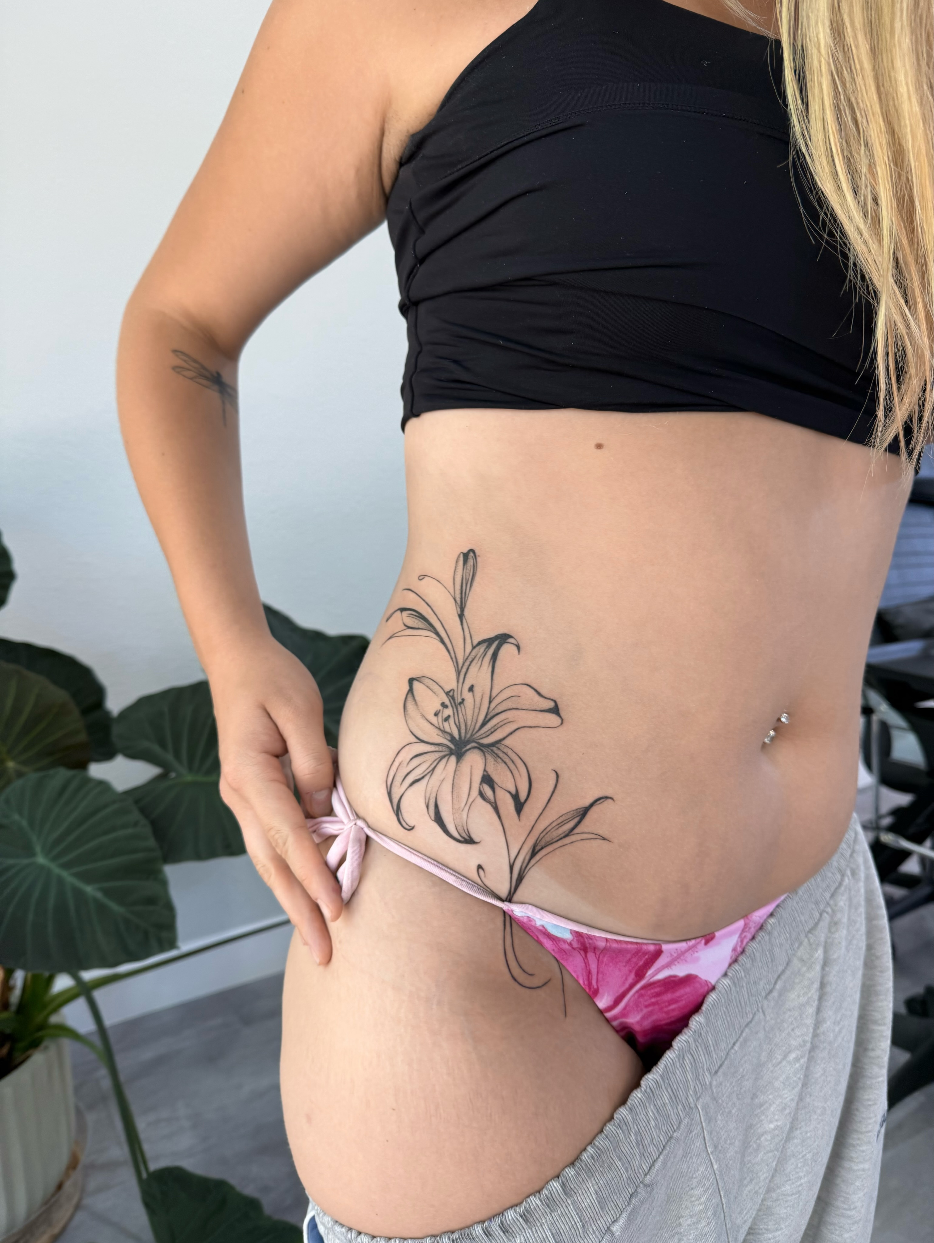 Tattoo by @pomaikai.artistry — black_and_grey