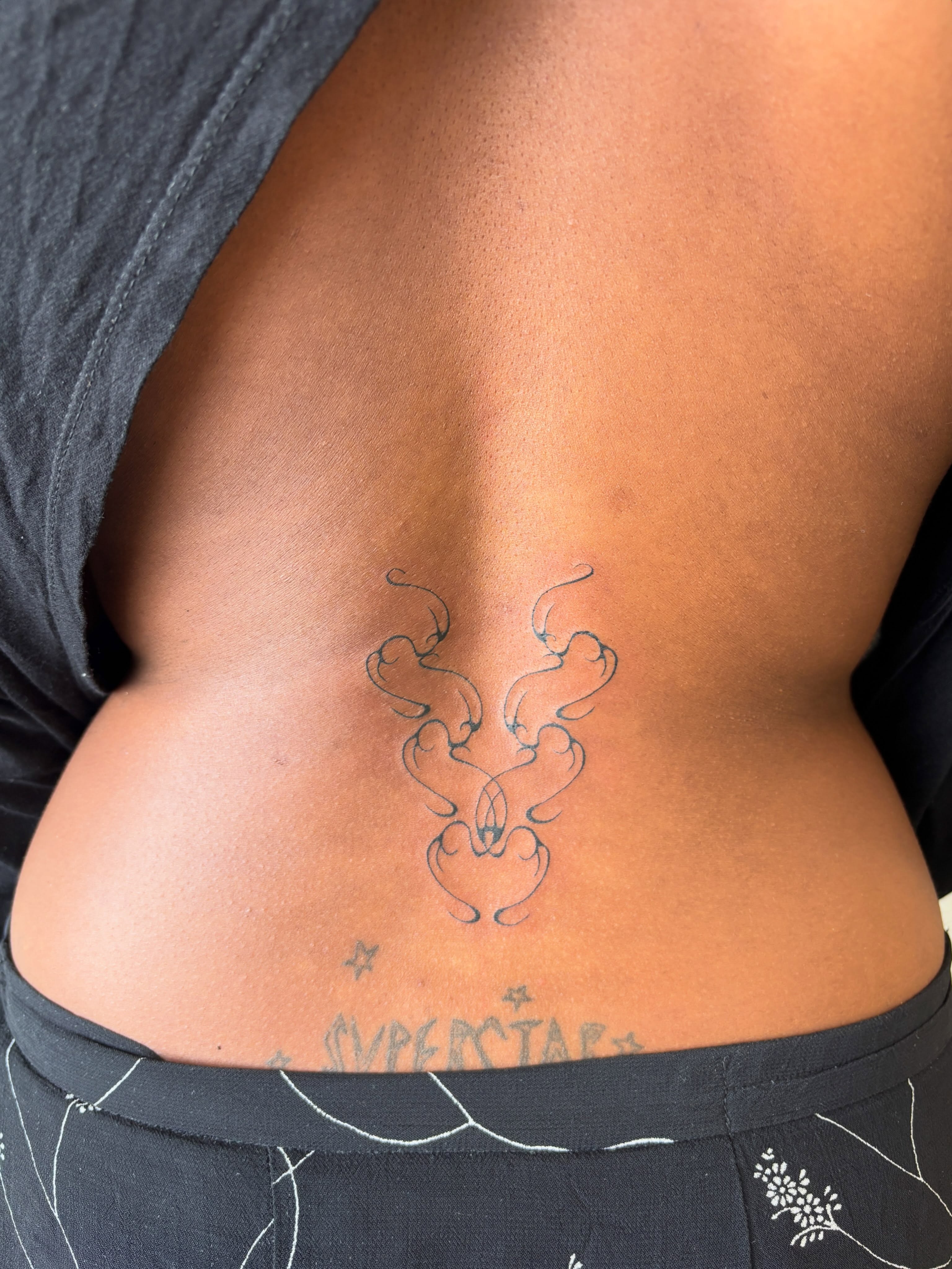 Smoke minimalist tattoo on the back by ꜱʜɪʀʟᴇʏ