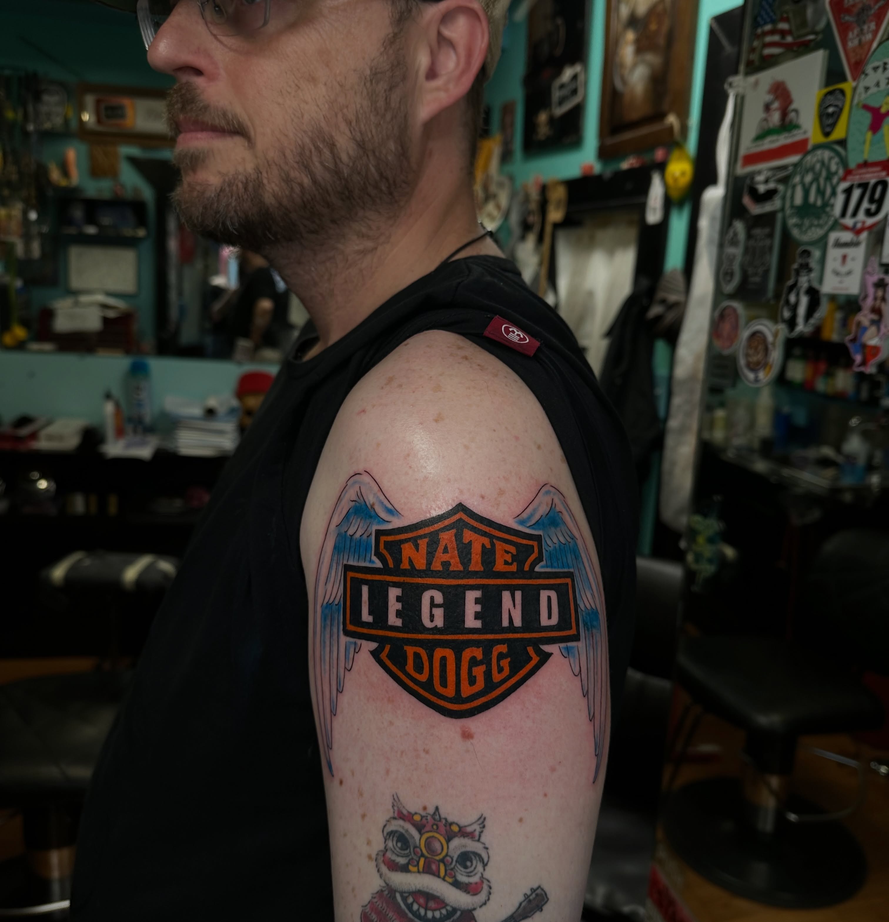 Nate Legend Dogg American traditional tattoo on the shoulder by Savy Rasor, Austin, Texas
