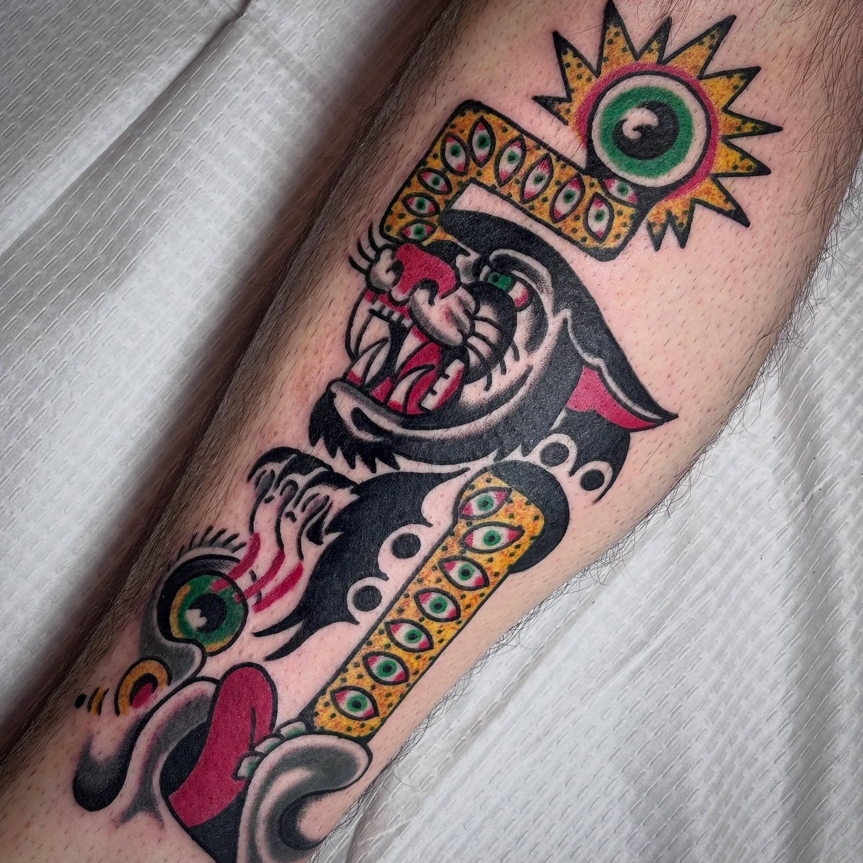 Jester American traditional tattoo on the forearm by Malachi