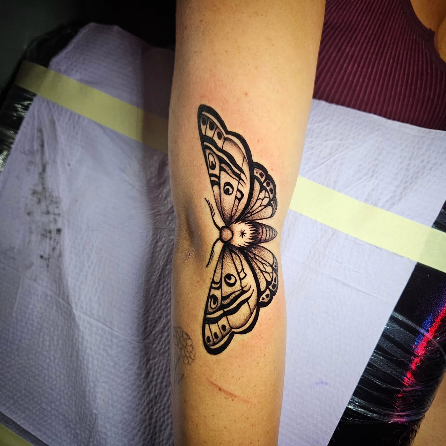 Butterfly black and grey tattoo on the forearm by Isaac Morales