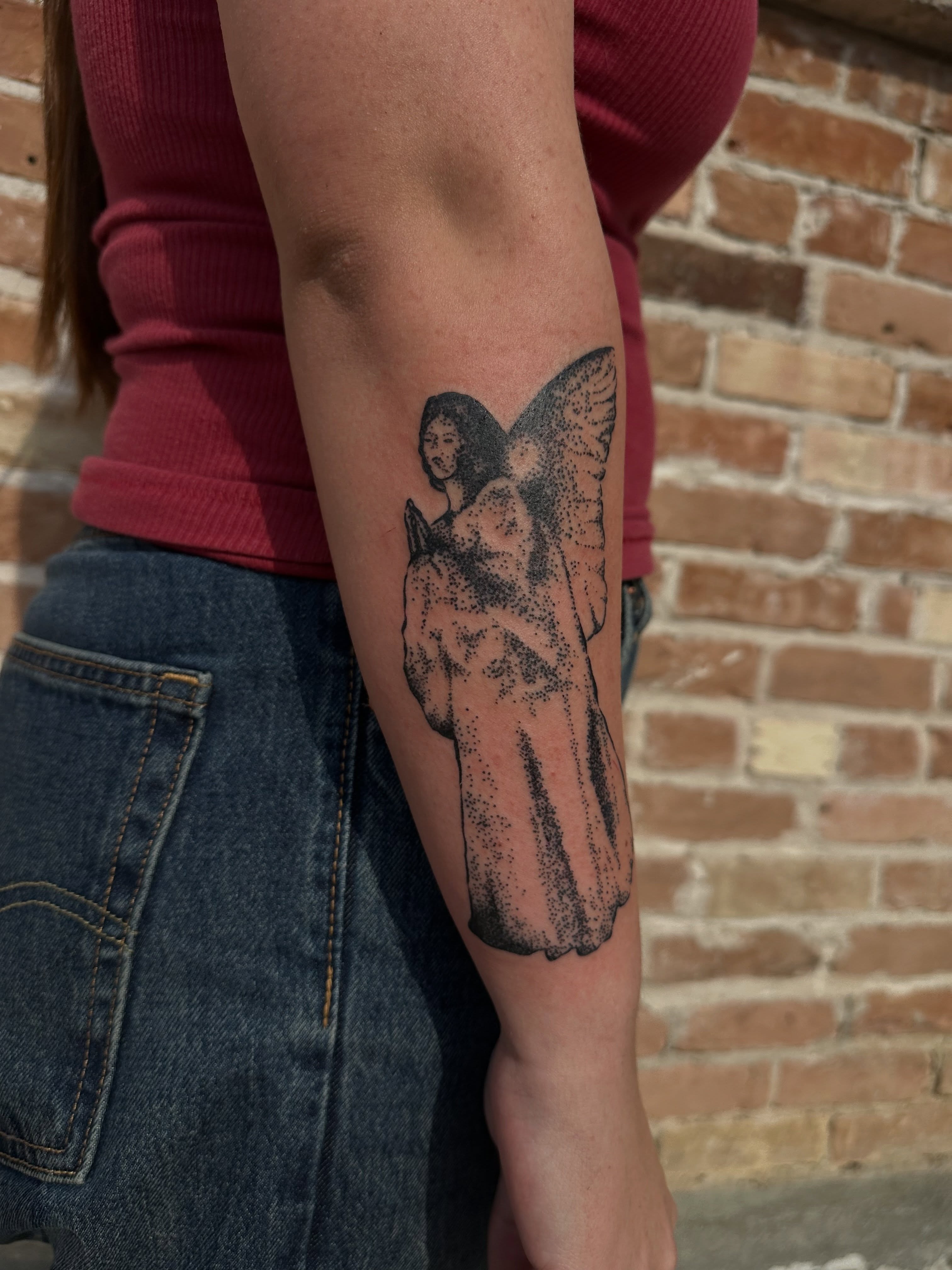 Angel dotwork tattoo on the forearm by 𝓡𝓸𝓼𝓮 𝓗𝓪𝔂𝓮𝓼