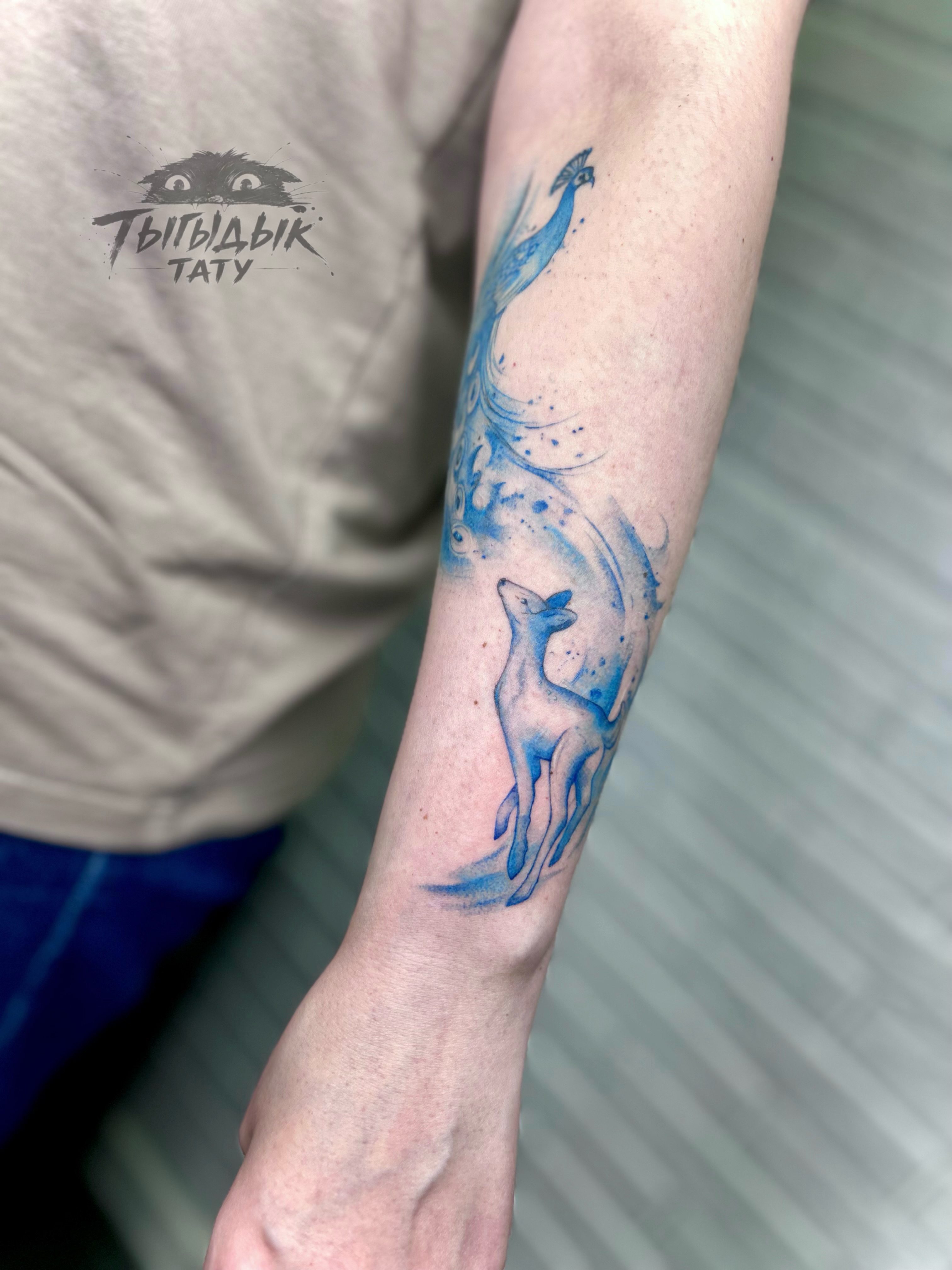 Tattoo by @tygydyk_tattoo — dotwork, watercolor