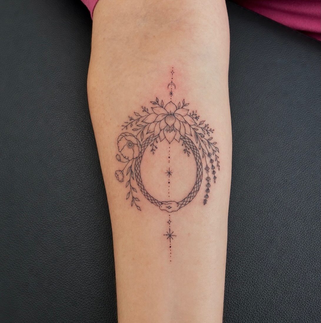 Floral wreath dotwork tattoo on the forearm by Lexie Decker, Canton, Ohio