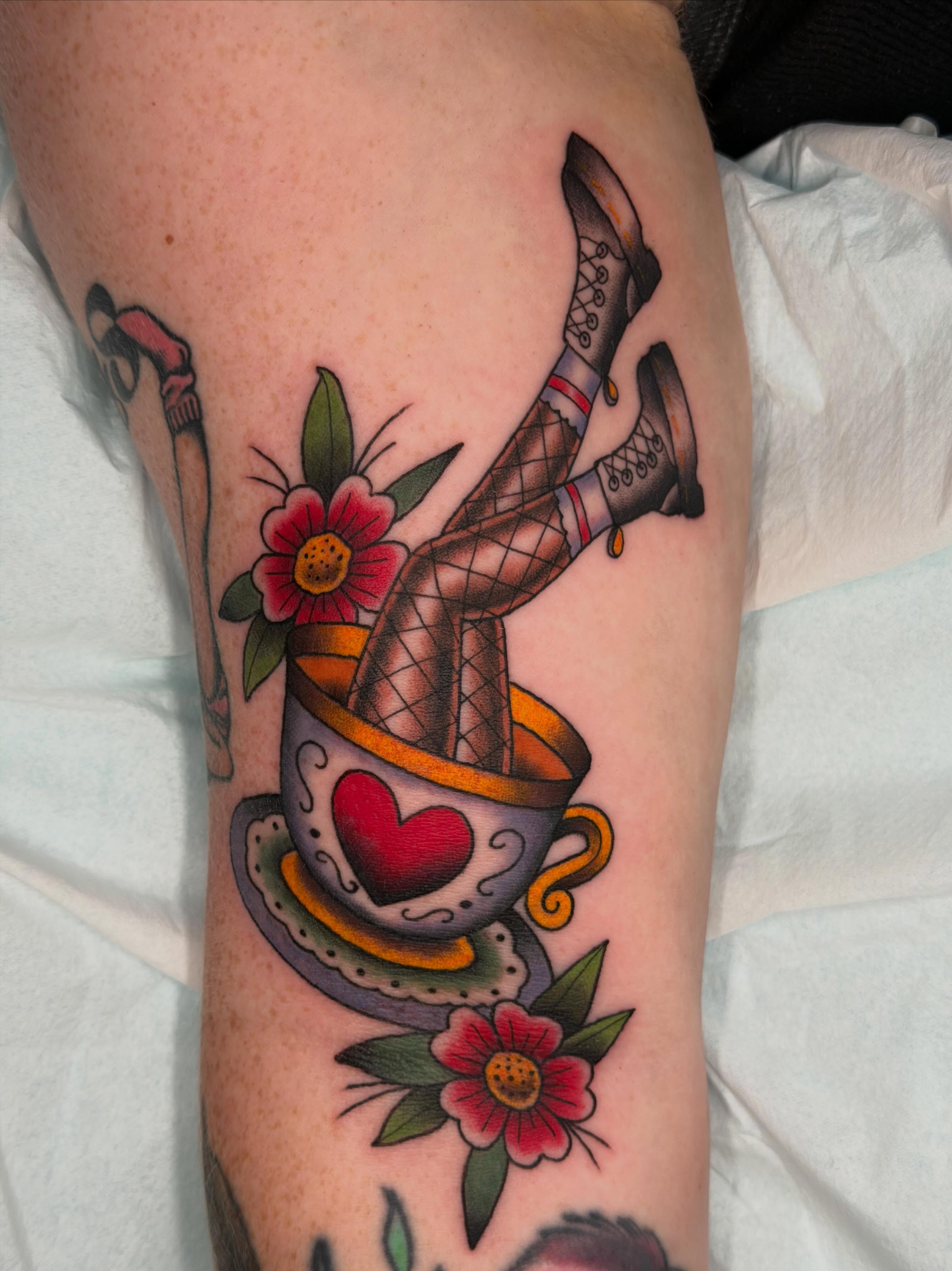 Teacup and legs American traditional tattoo on the forearm by ♥︎ ᴅᴇᴠ ʀᴇɴᴇᴇ ♥︎