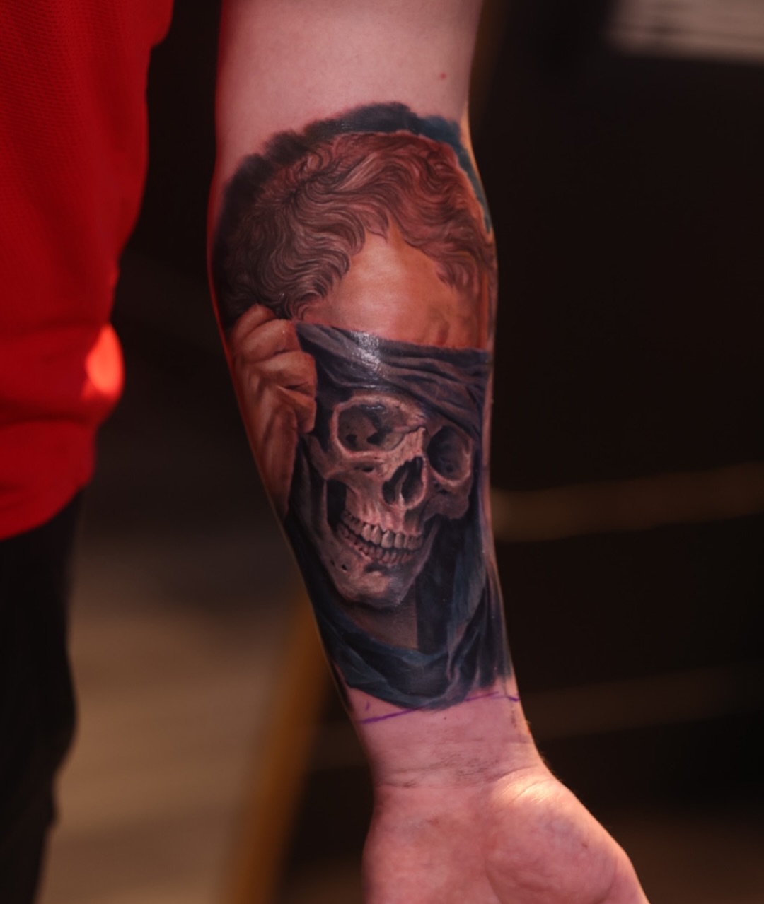 Skull with blindfold realism tattoo on the forearm by Brandon Sontag