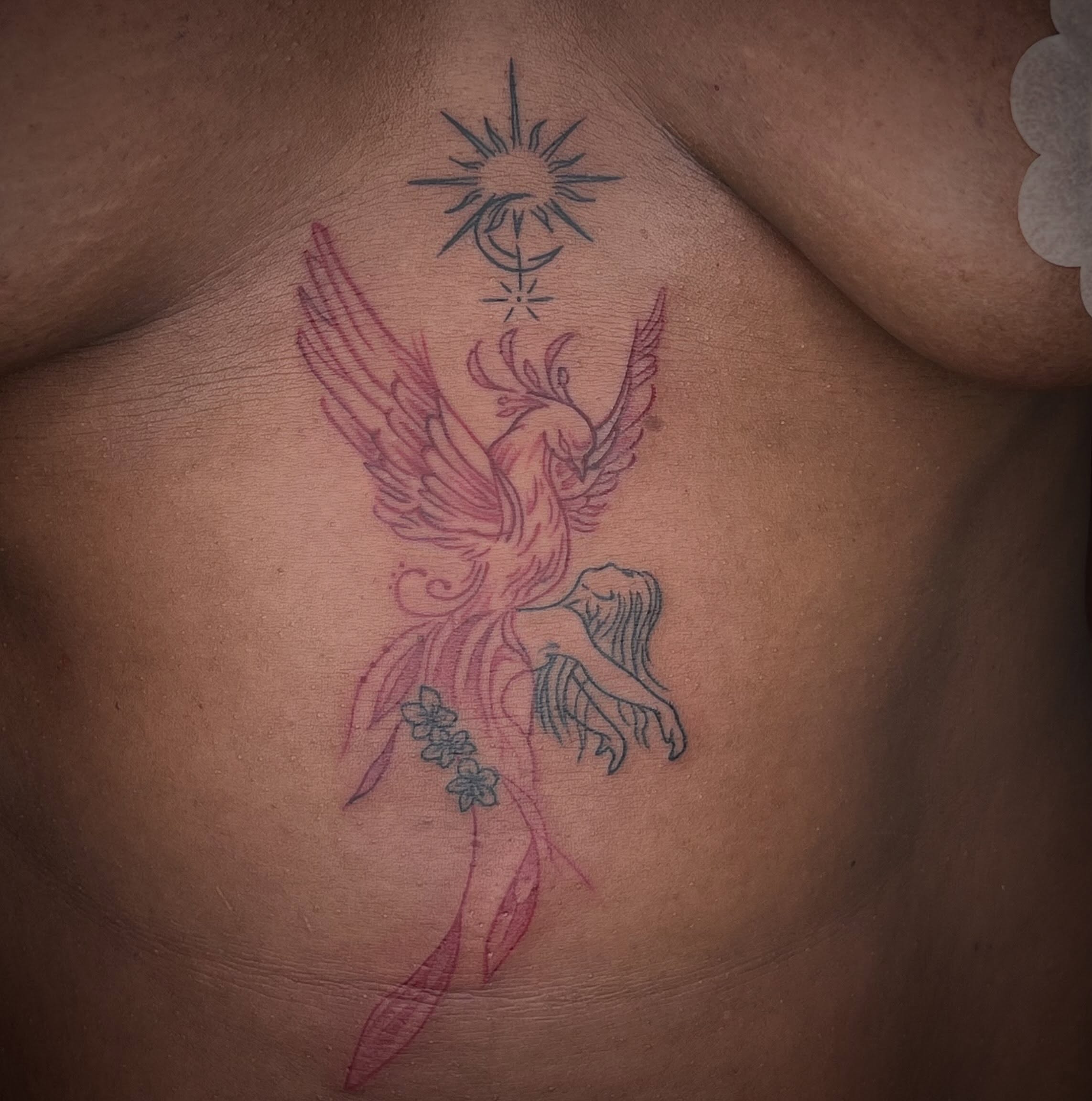 Phoenix neo-traditional tattoo on the chest by Tattoo (Réaliste), Toulouse, Occitanie