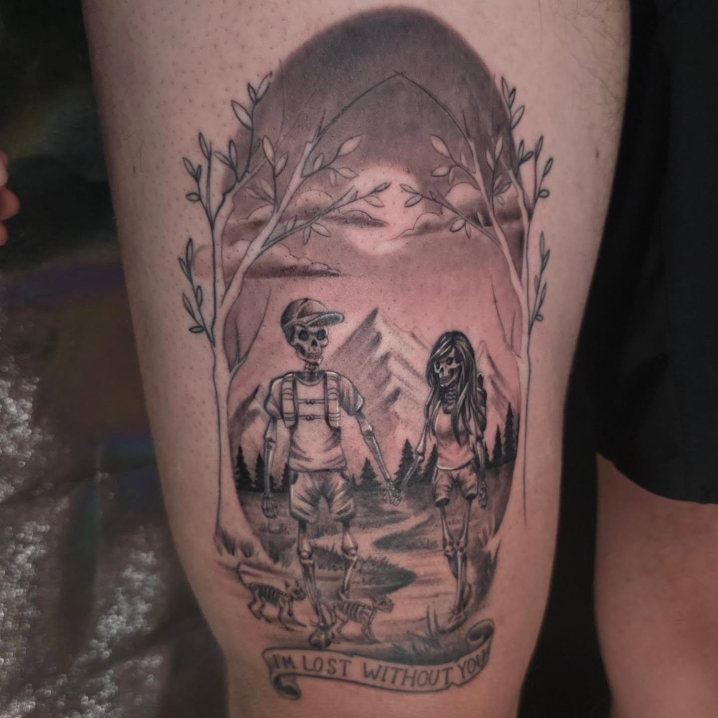 Couple walking in forest realism tattoo on the forearm by Kosta