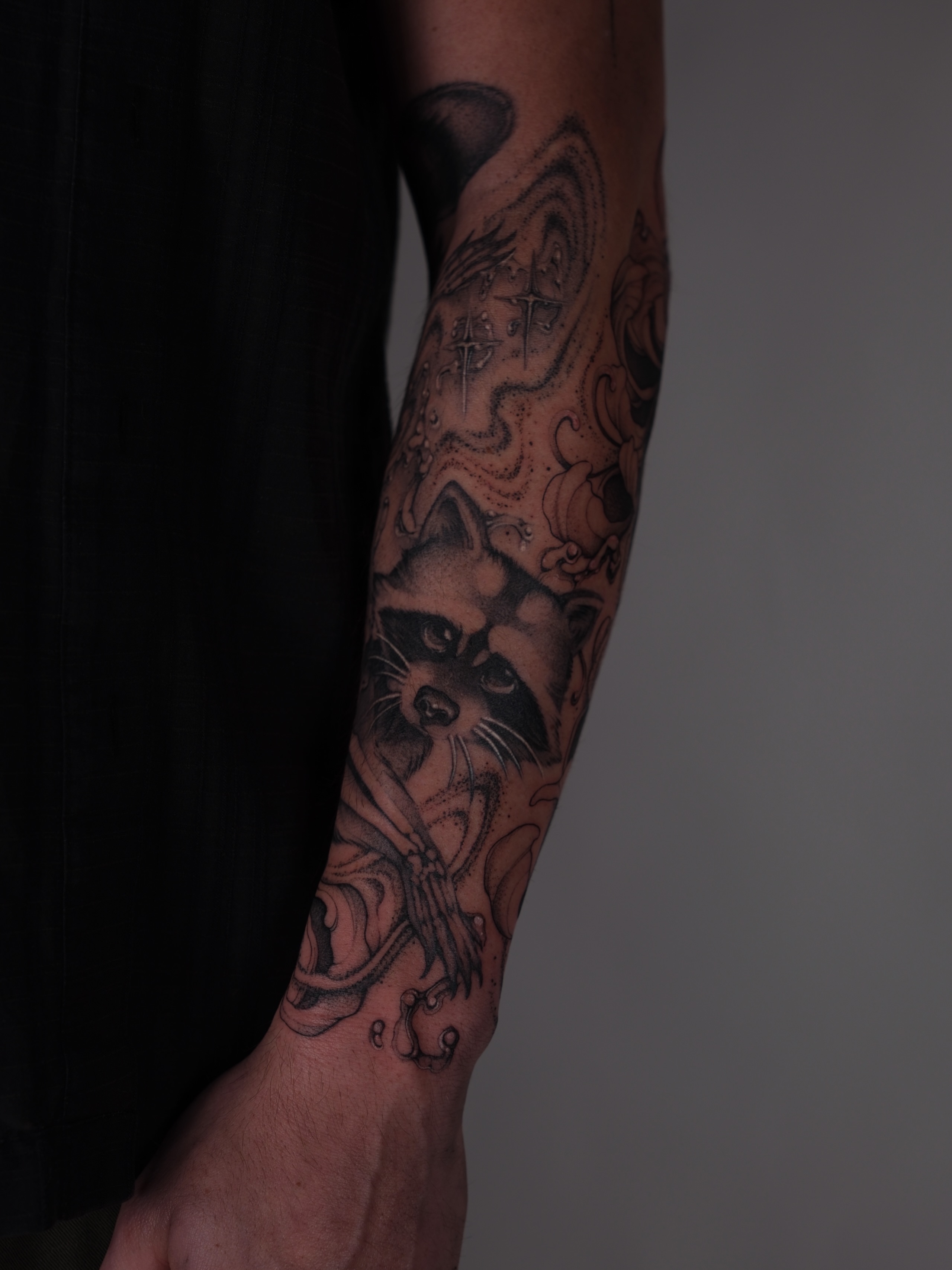 Raccoon American traditional tattoo on the forearm by ella