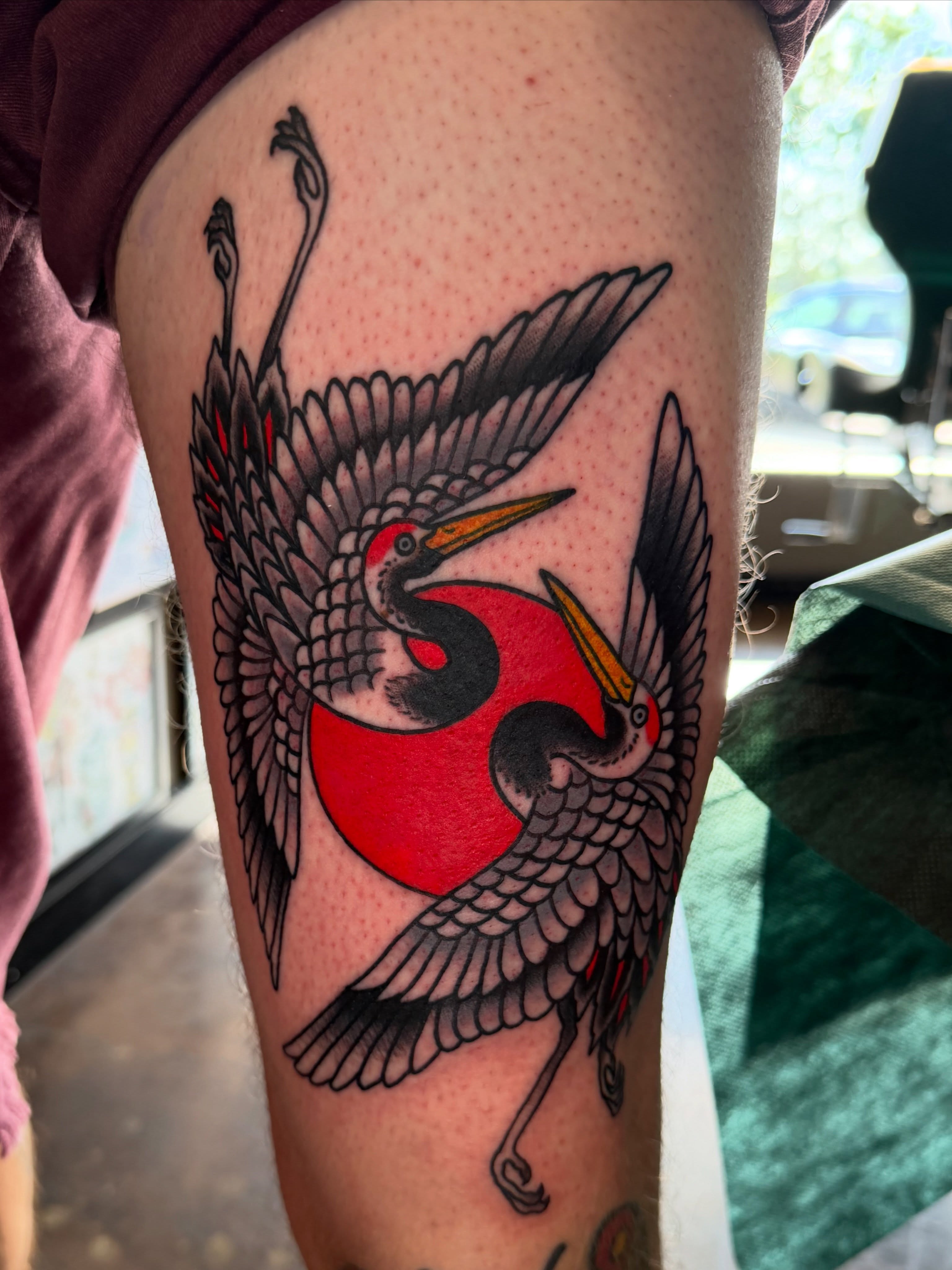 Cranes American traditional tattoo on the thigh by Christopher Mikesell