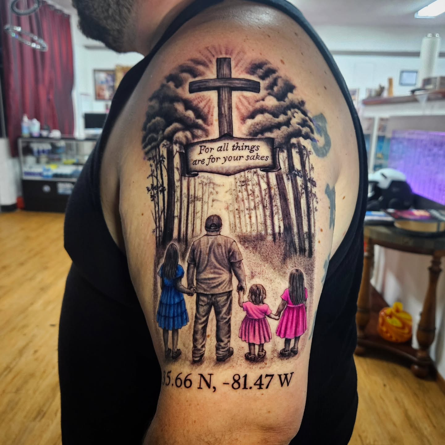Family scene realism tattoo on the shoulder by Isaac Morales